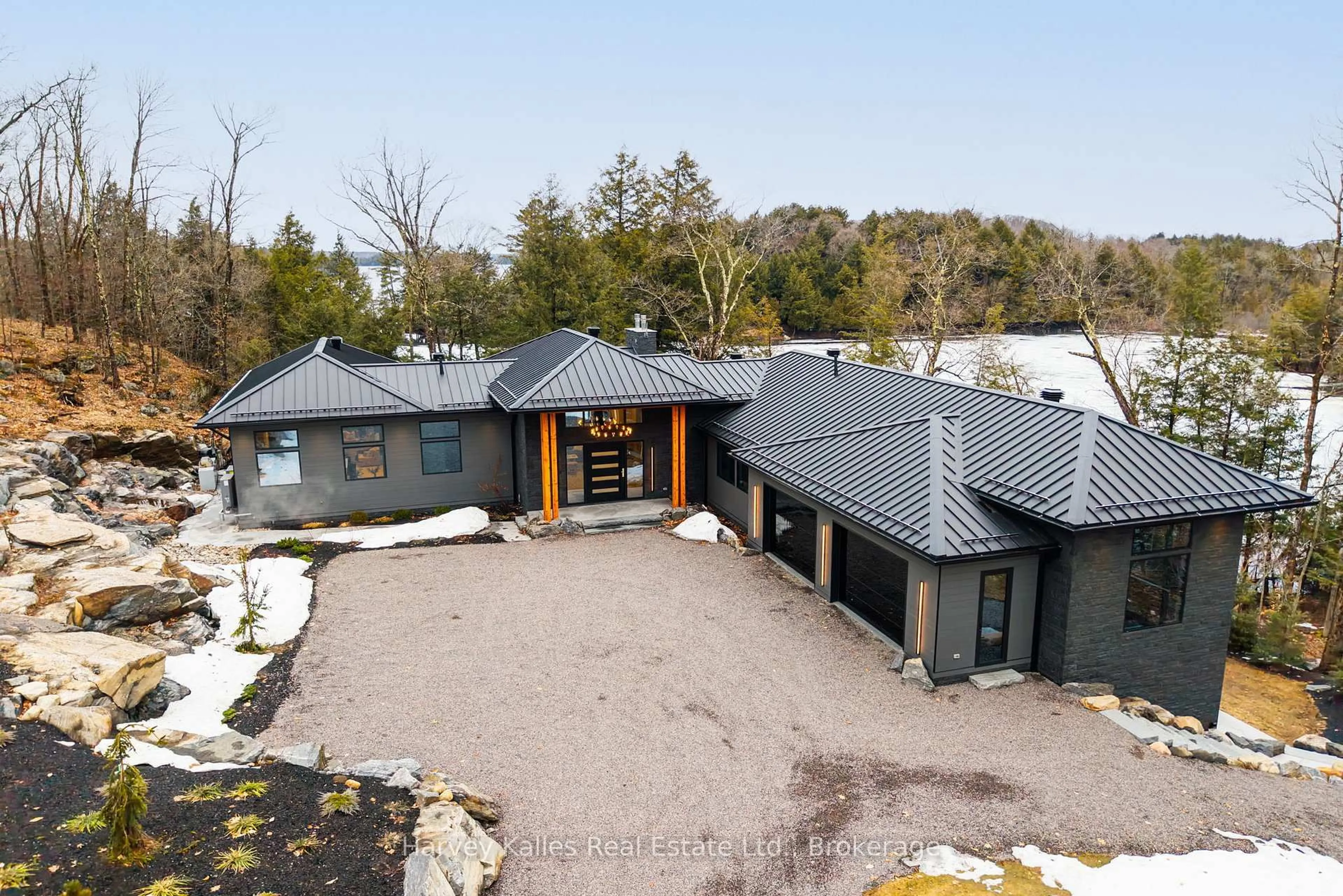 A pic from outside/outdoor area/front of a property/back of a property/a pic from drone, unknown for 1013 Hall's Rd #2, Muskoka Lakes Ontario P0B 1J0