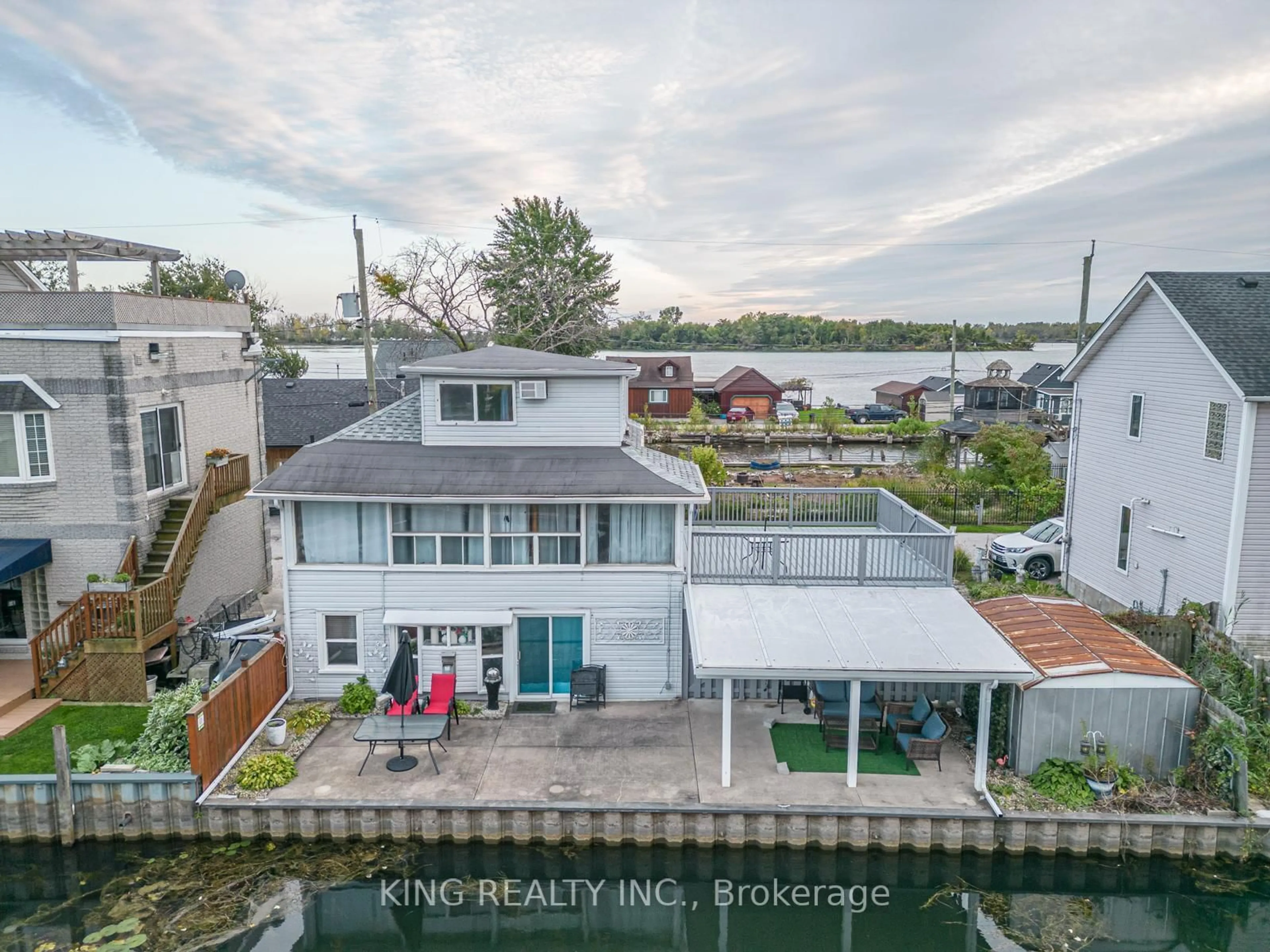 A pic from outside/outdoor area/front of a property/back of a property/a pic from drone, water/lake/river/ocean view for 42 Wahneta Ave, LaSalle Ontario N9J 1T7