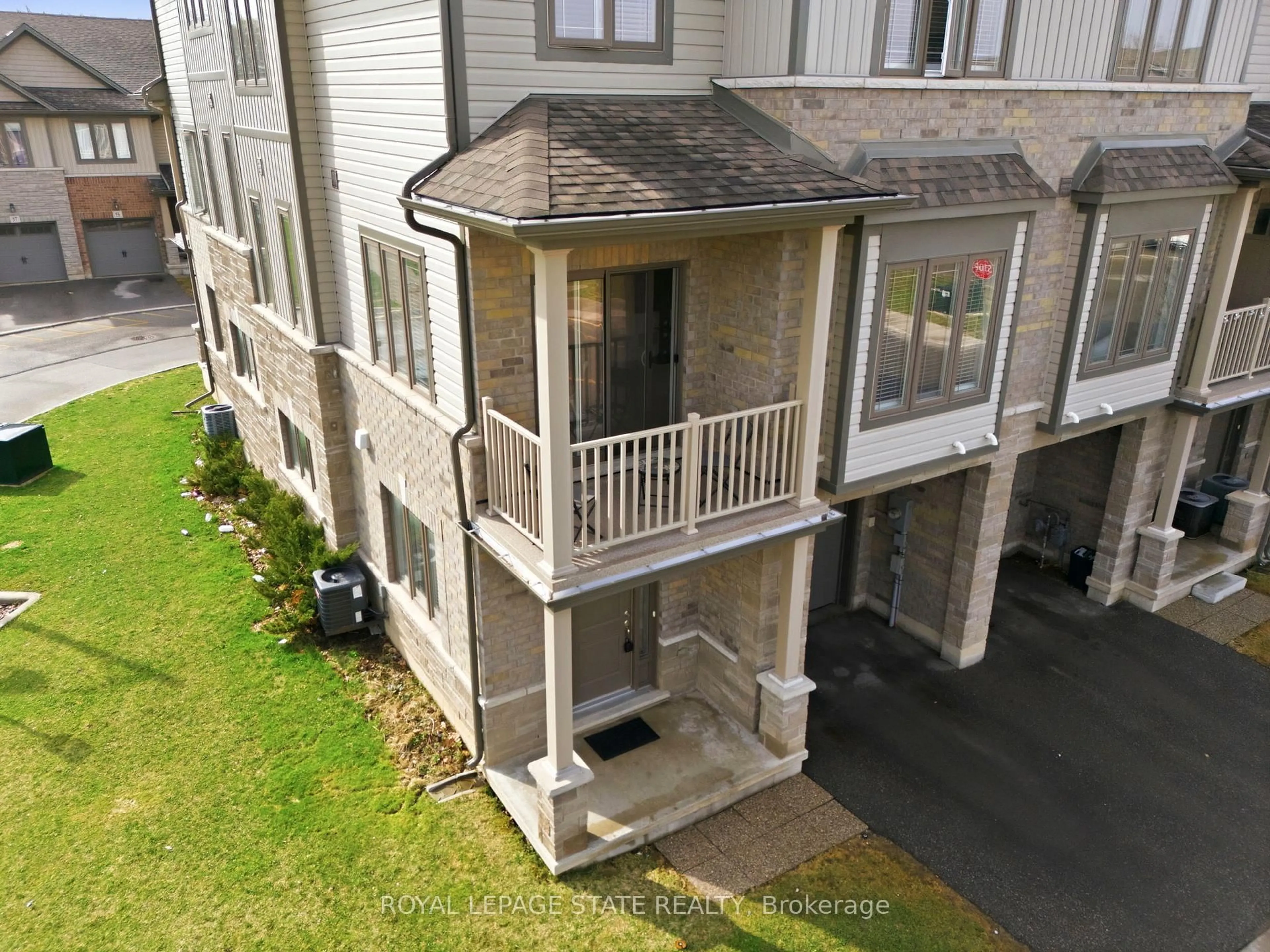 A pic from outside/outdoor area/front of a property/back of a property/a pic from drone, city buildings view from balcony for 77 Diana Ave #160, Brantford Ontario N3T 0R6