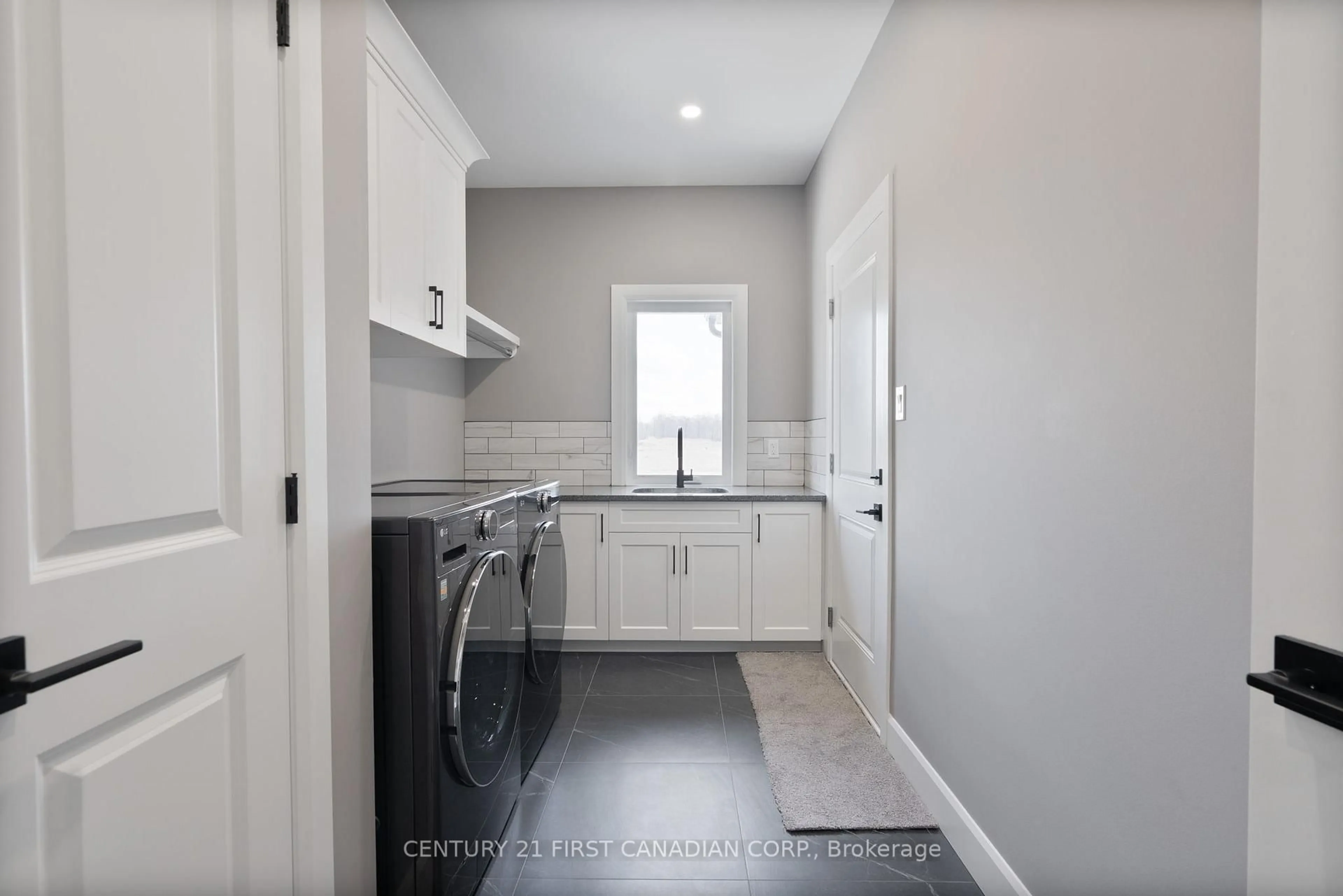 Laundry room for 110 Sheldabren St, North Middlesex Ontario N0M 1A0