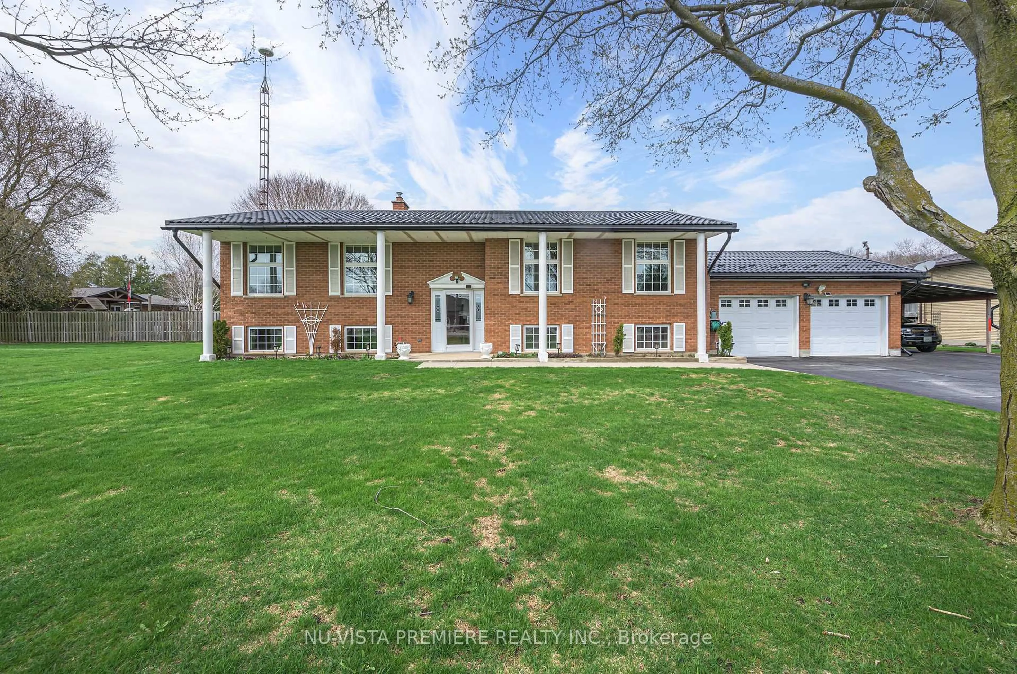 A pic from outside/outdoor area/front of a property/back of a property/a pic from drone, street for 15298 Medway Rd, Middlesex Centre Ontario N0M 1C0