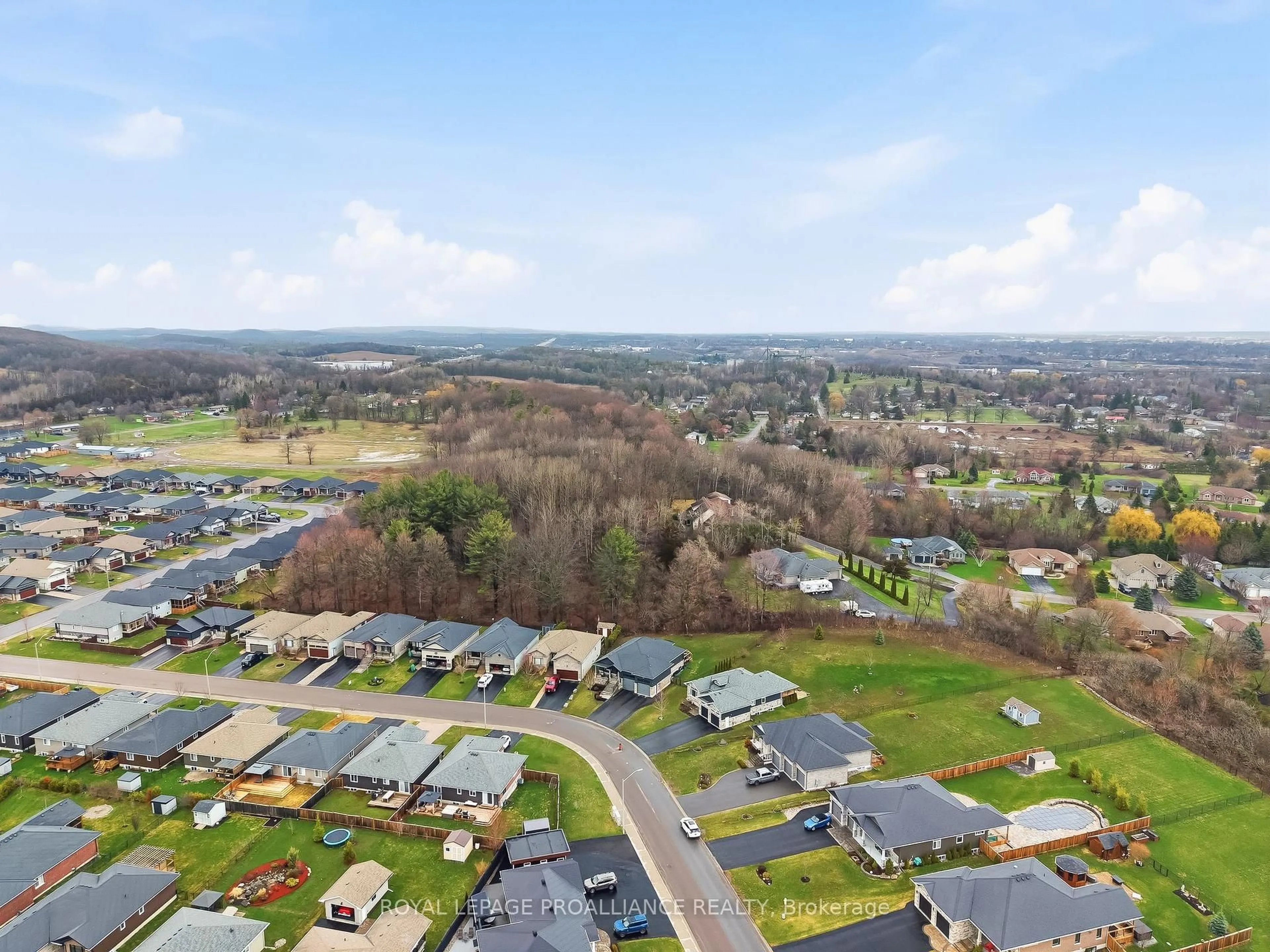 A pic from outside/outdoor area/front of a property/back of a property/a pic from drone, mountain view for 19 Autumn Grve, Quinte West Ontario K8V 0G9