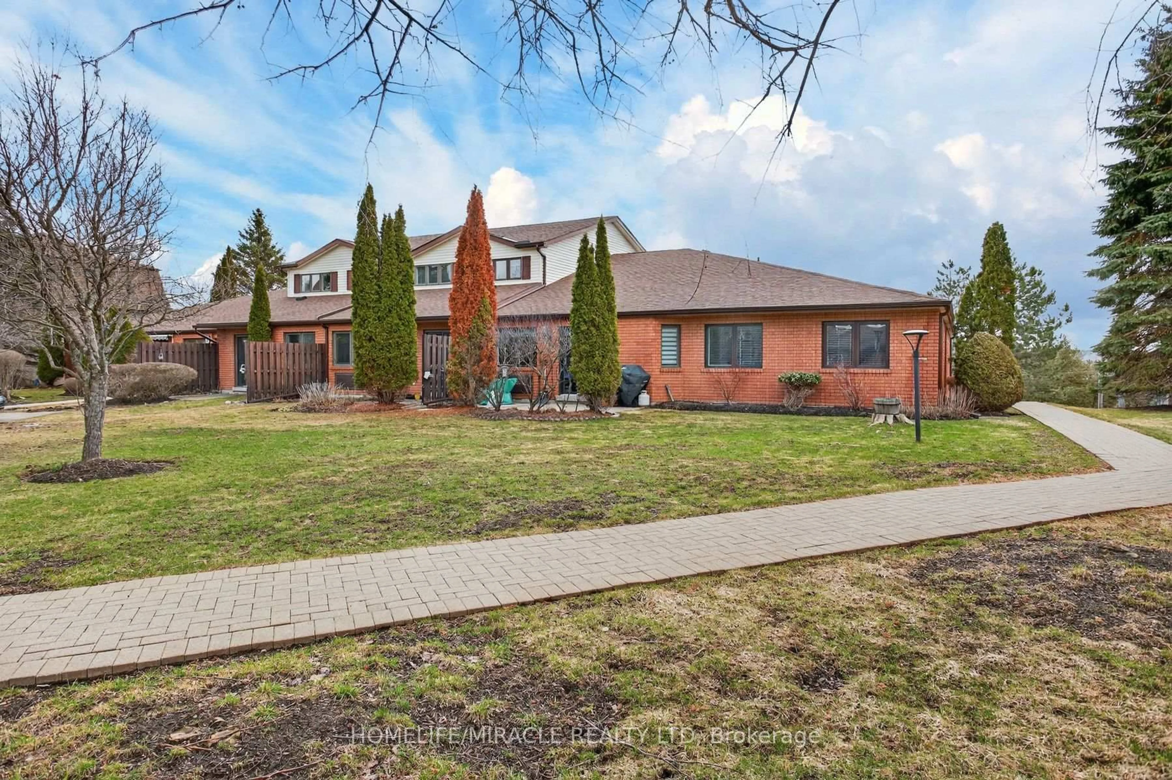 Home with brick exterior material, street for 36 Champlain Cres #32, Peterborough Ontario K9L 1T1