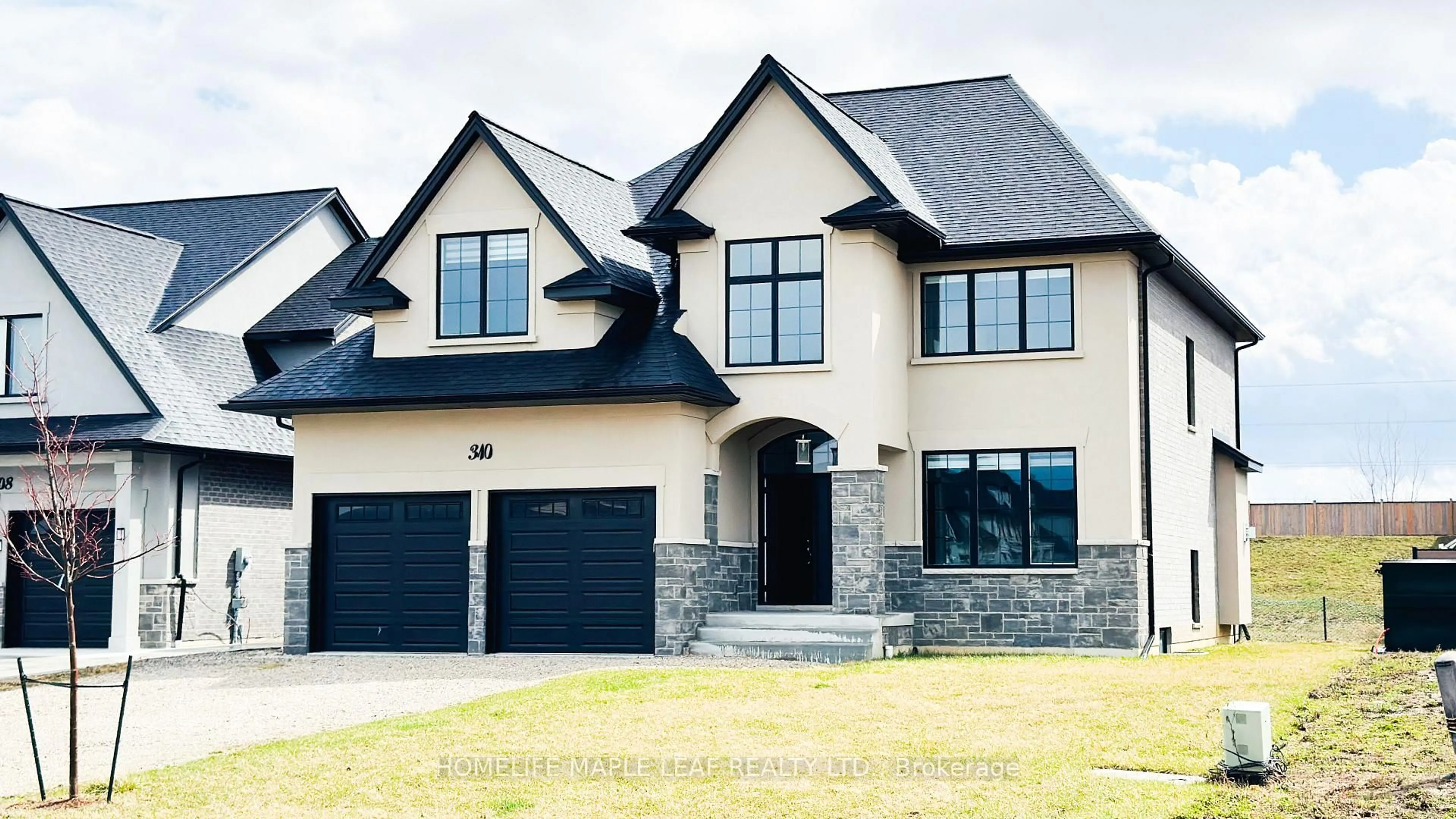 Home with brick exterior material, street for 310 Blake Ave, Lakeshore Ontario N8L 1B6