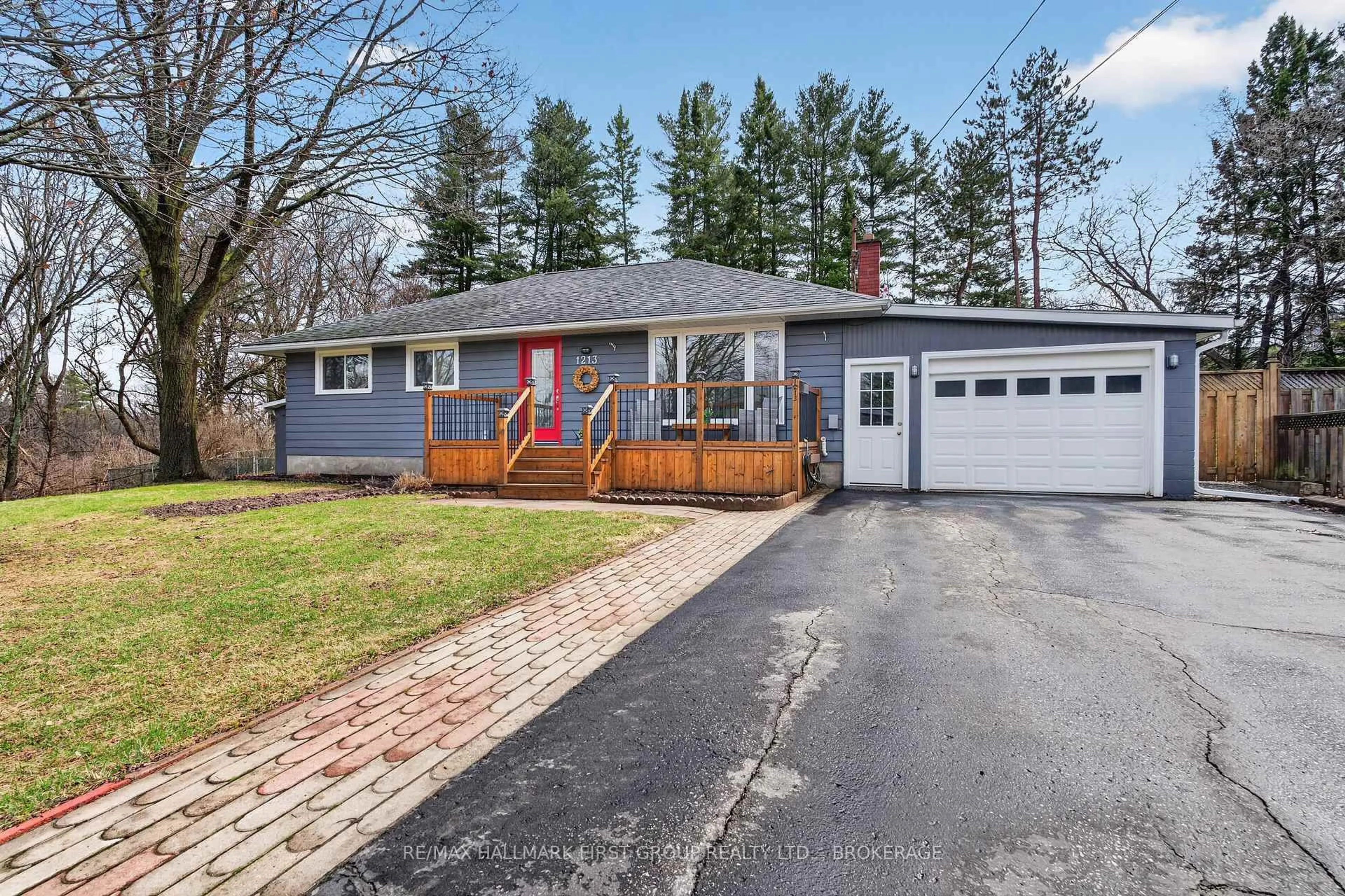 Home with vinyl exterior material, street for 1213 Brass Dr, Kingston Ontario K7M 3M2