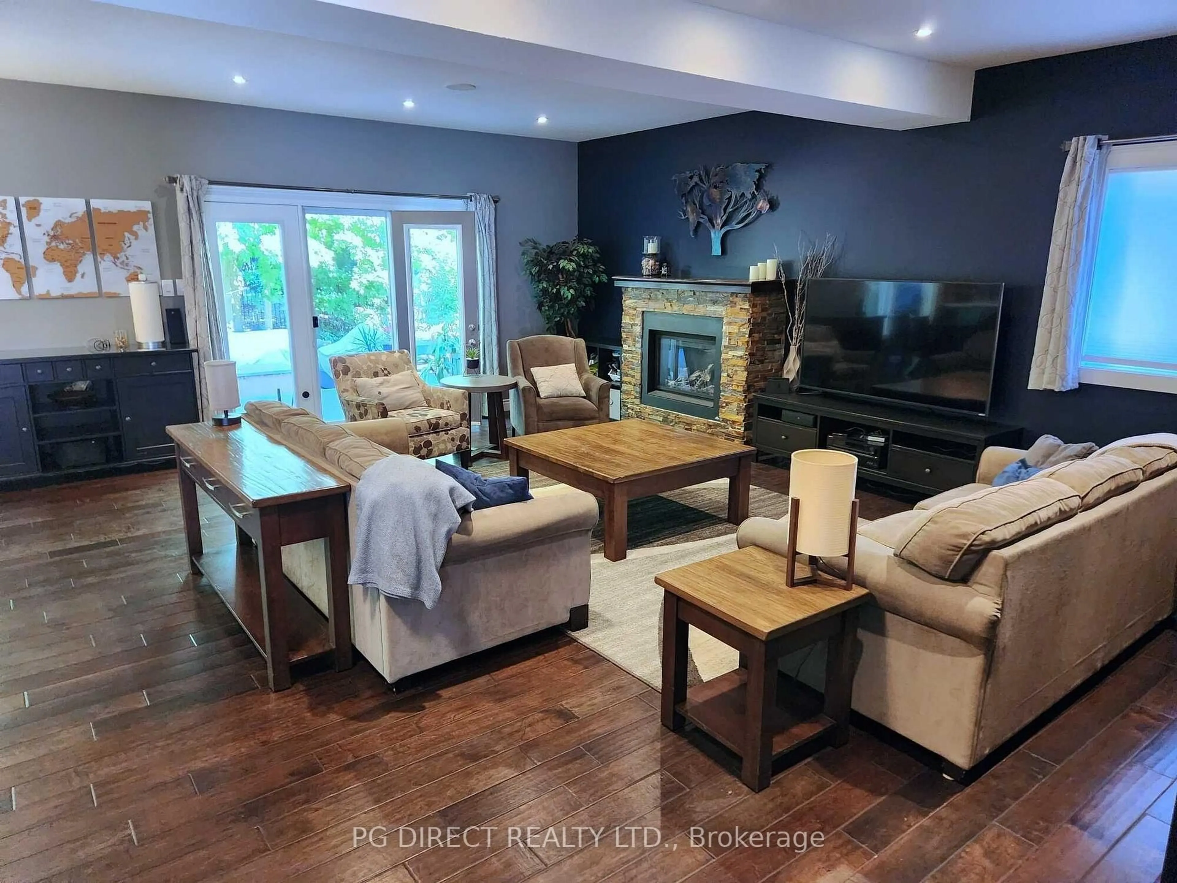 Living room with furniture, wood/laminate floor for 242 Cheltonwood Cres, Waterloo Ontario N2V 1X9