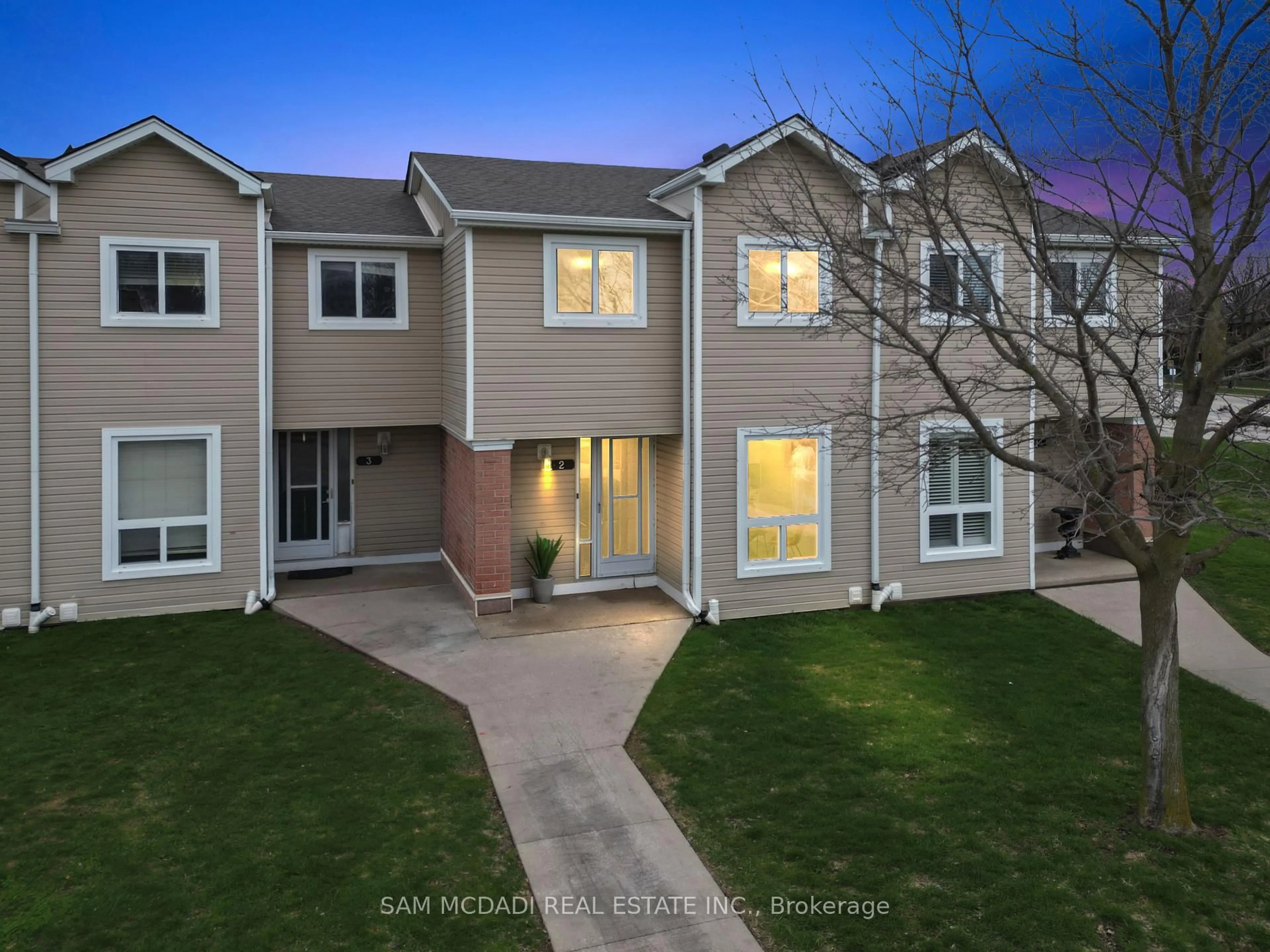 A pic from outside/outdoor area/front of a property/back of a property/a pic from drone, street for 160 Rittenhouse Rd #2, Kitchener Ontario N2E 3E9