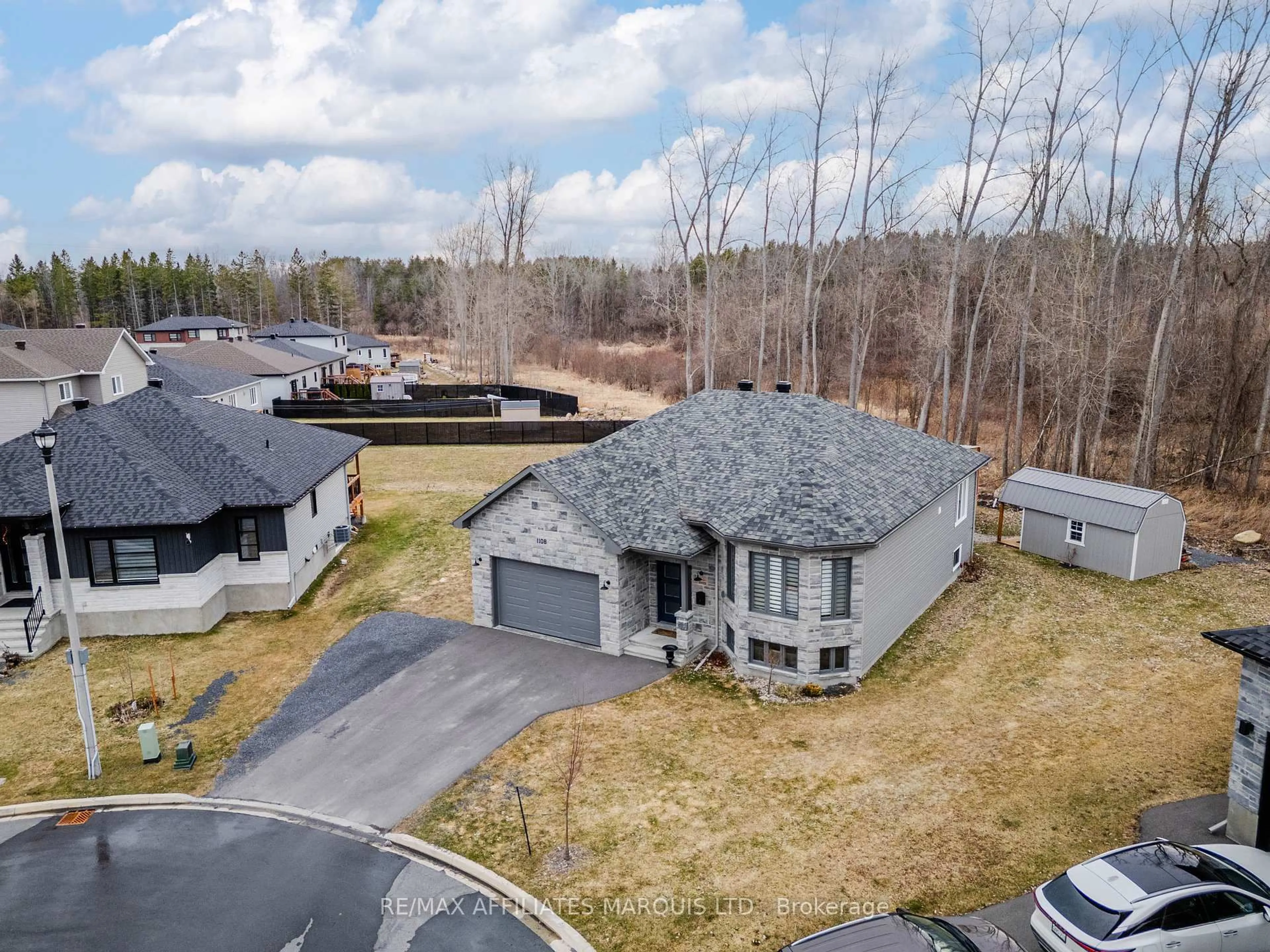 A pic from outside/outdoor area/front of a property/back of a property/a pic from drone, street for 1108 Nicolas Cres, Cornwall Ontario K6J 0C1
