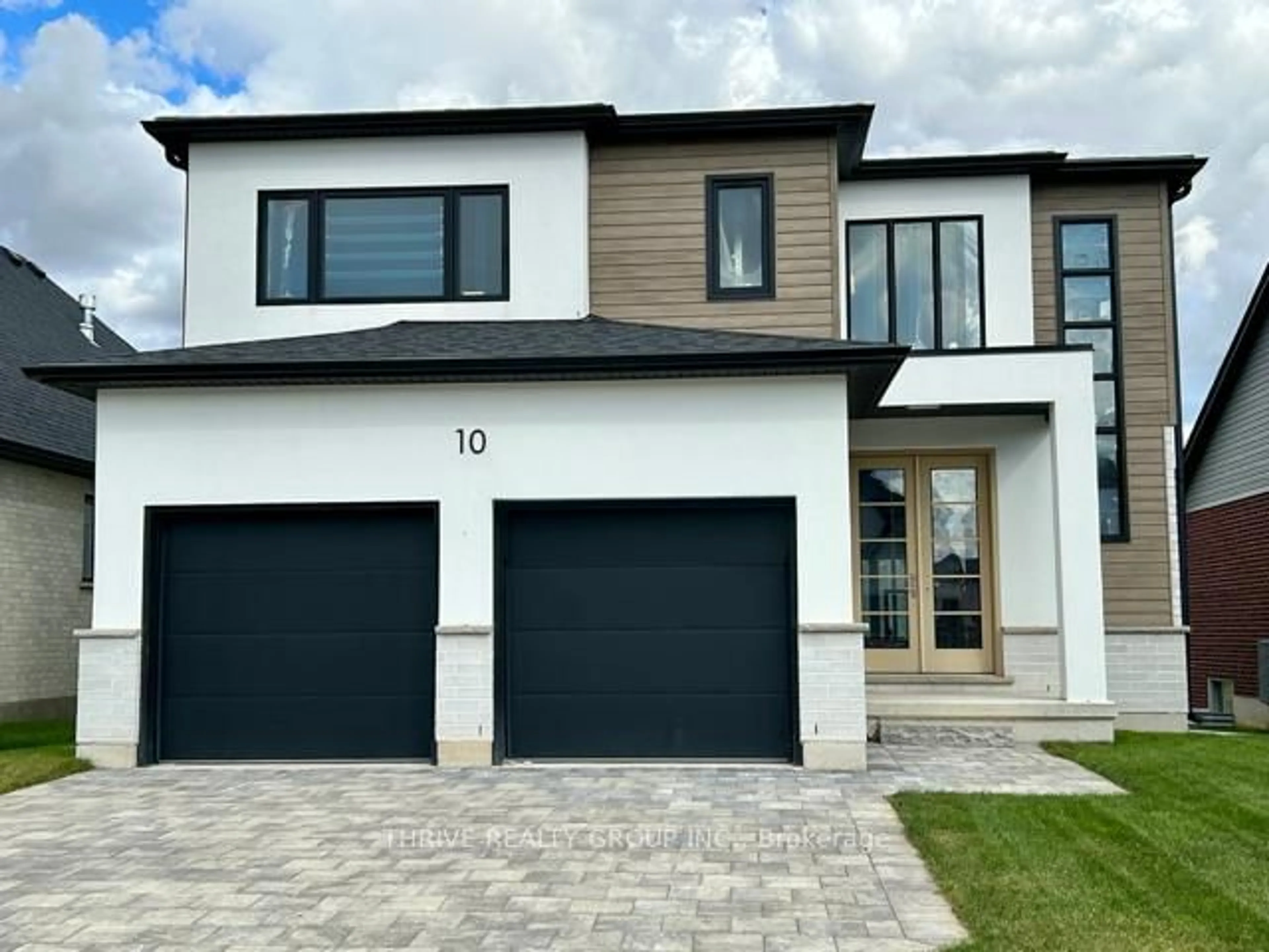 Home with vinyl exterior material, street for 10 Aspen Circ, Thames Centre Ontario N0M 2P0