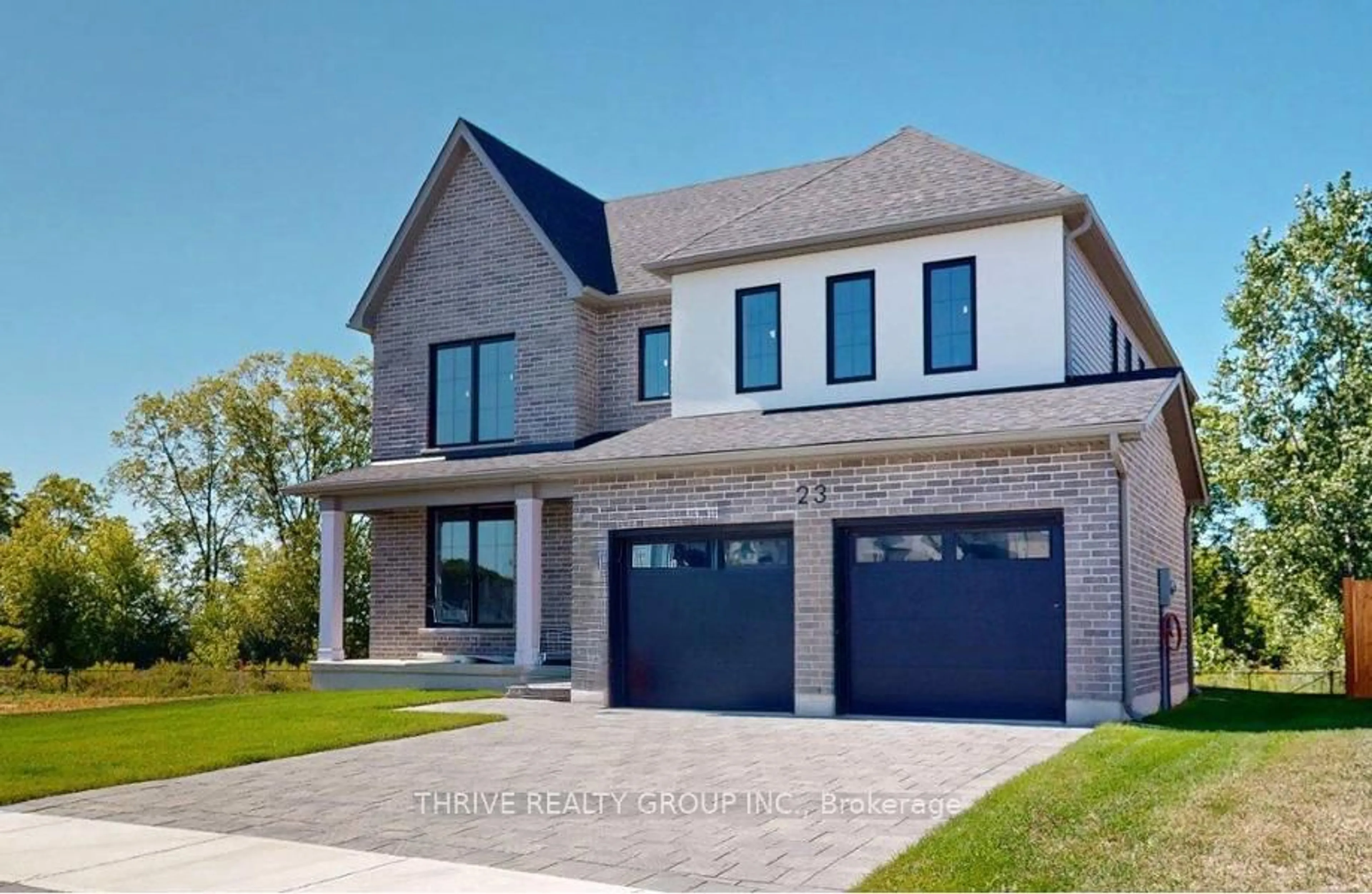 Home with brick exterior material, street for 23 Aspen Circ, Thames Centre Ontario N0M 2P0