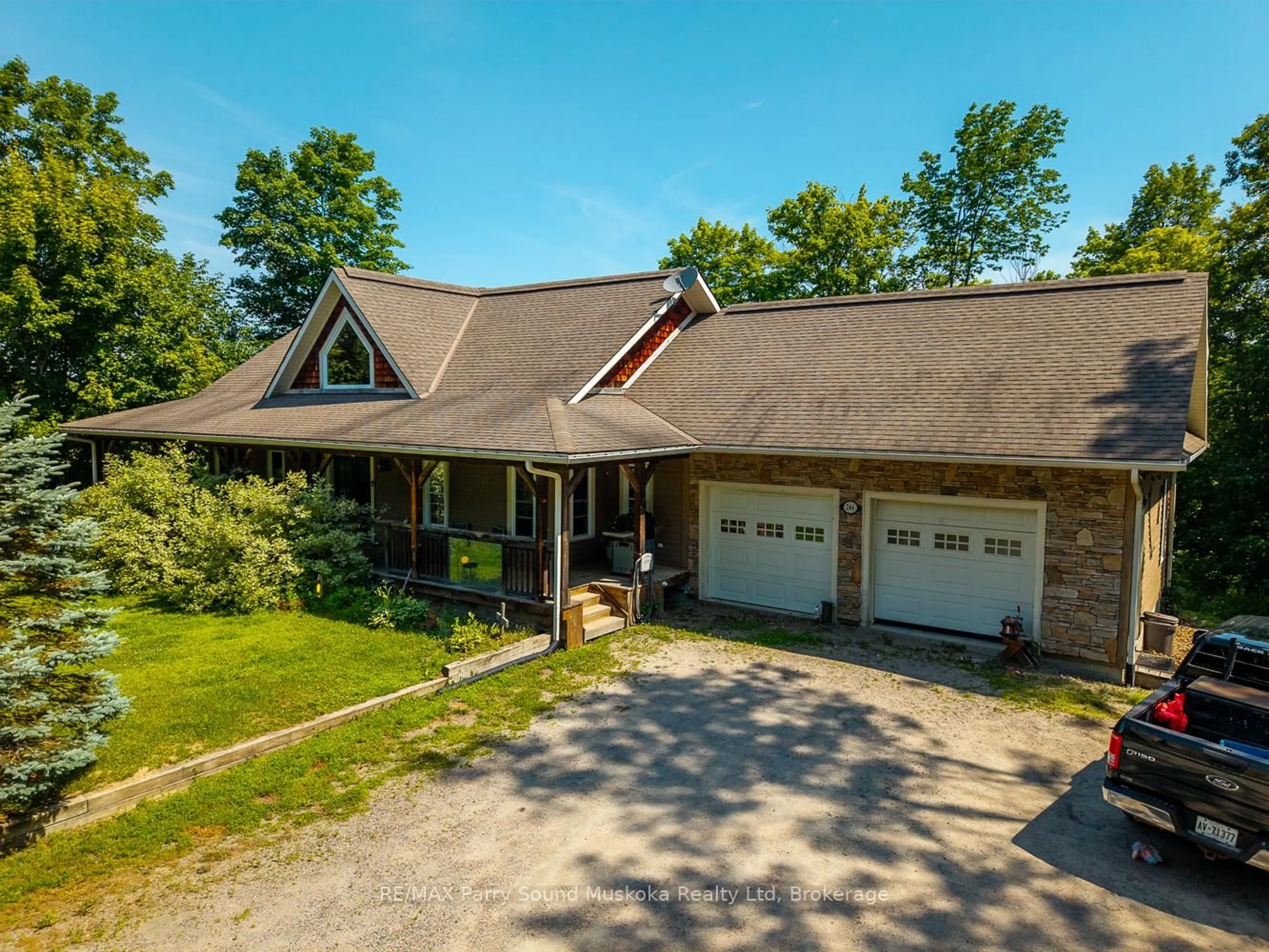 A pic from outside/outdoor area/front of a property/back of a property/a pic from drone, street for 246 High St, Georgian Bay Ontario P0C 1H0