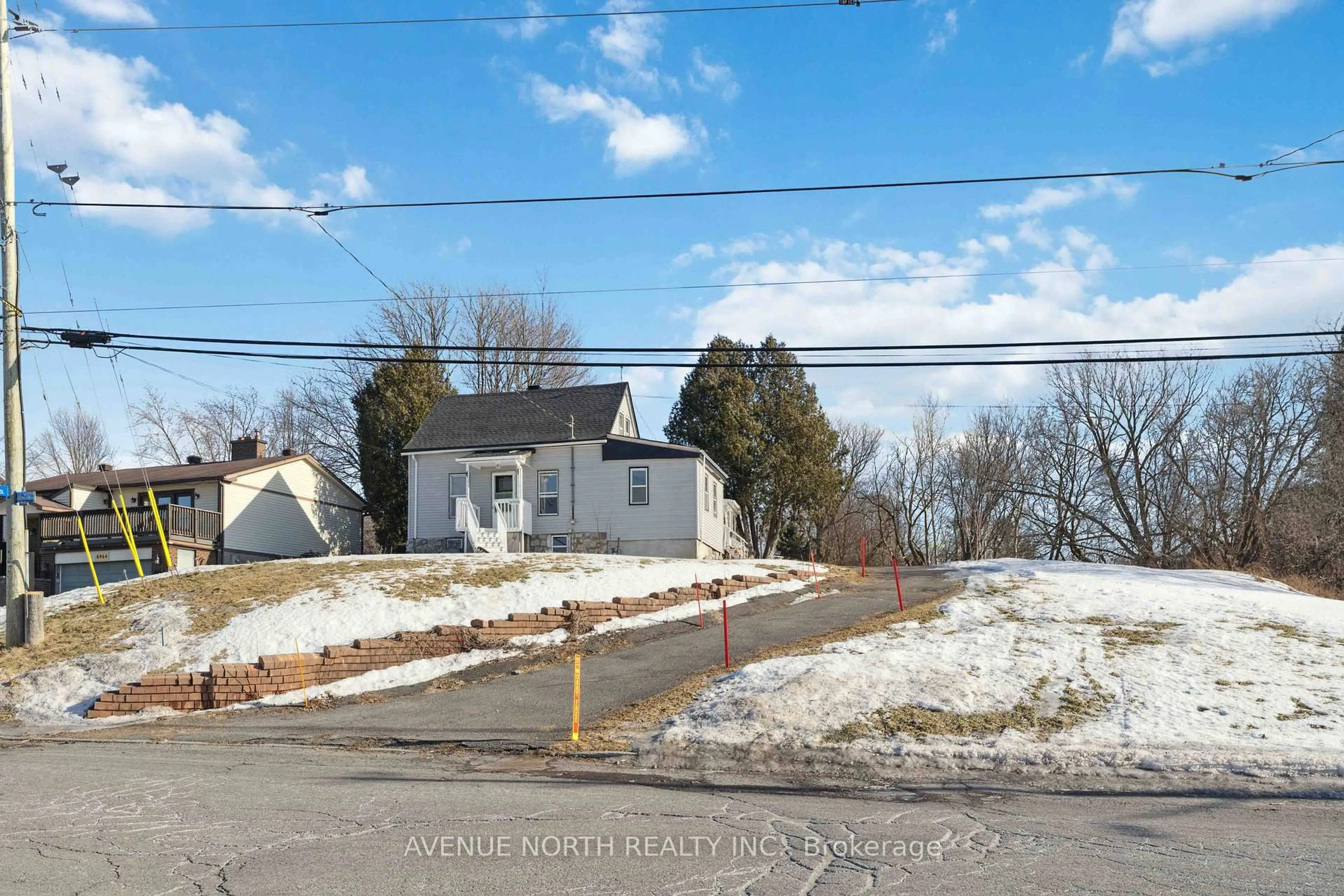 A pic from outside/outdoor area/front of a property/back of a property/a pic from drone, street for 6958 Notre Dame St, Ottawa Ontario K1C 1H7