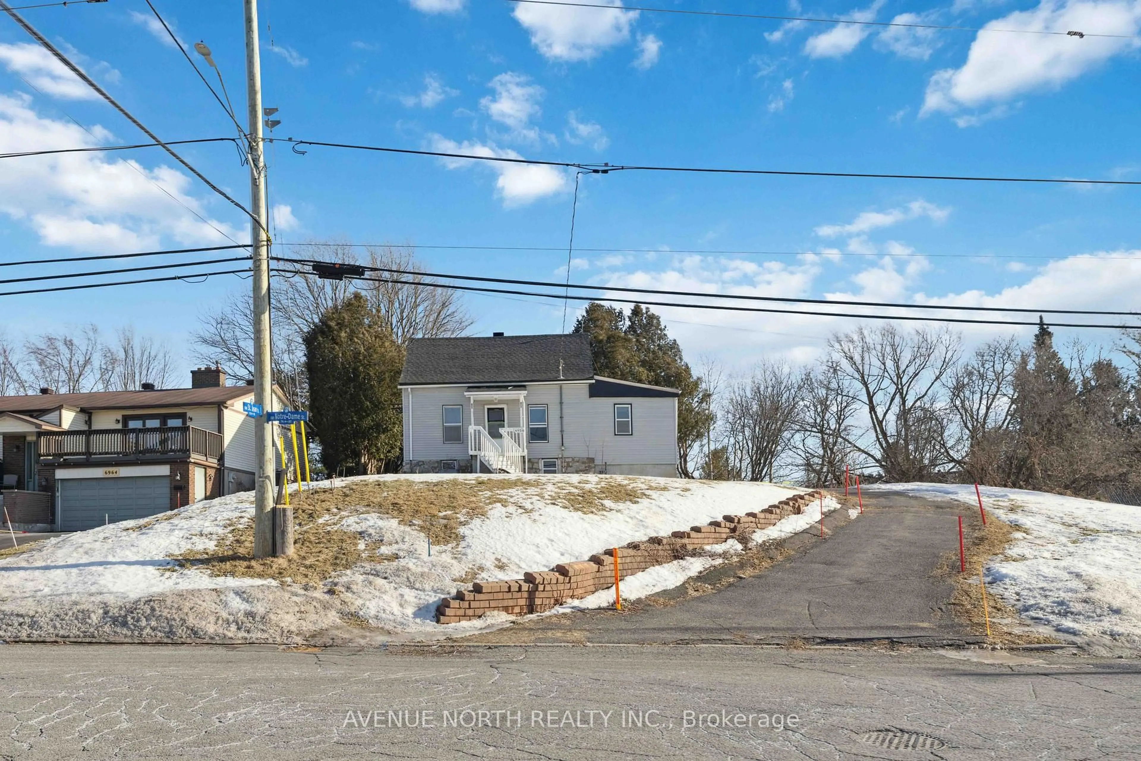 A pic from outside/outdoor area/front of a property/back of a property/a pic from drone, street for 6958 Notre Dame St, Ottawa Ontario K1C 1H7