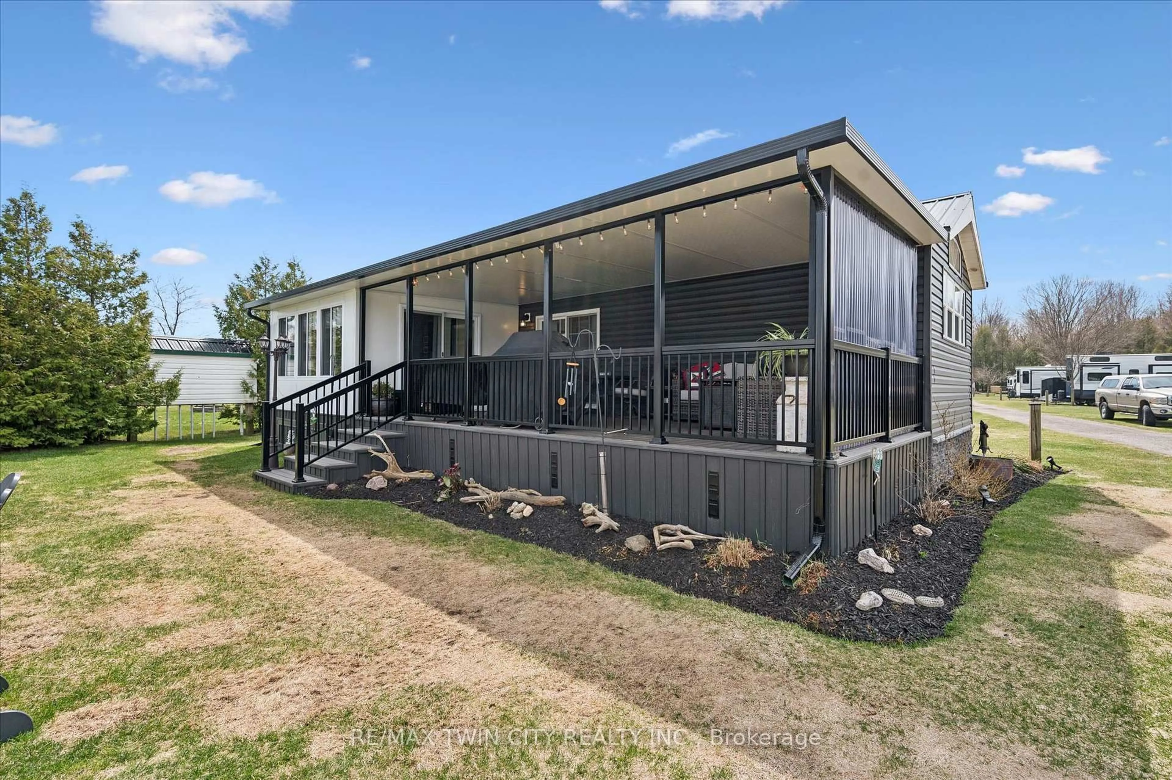 A pic from outside/outdoor area/front of a property/back of a property/a pic from drone, building for 930 Lakeshore Rd #83, Norfolk Ontario N0J 1T0