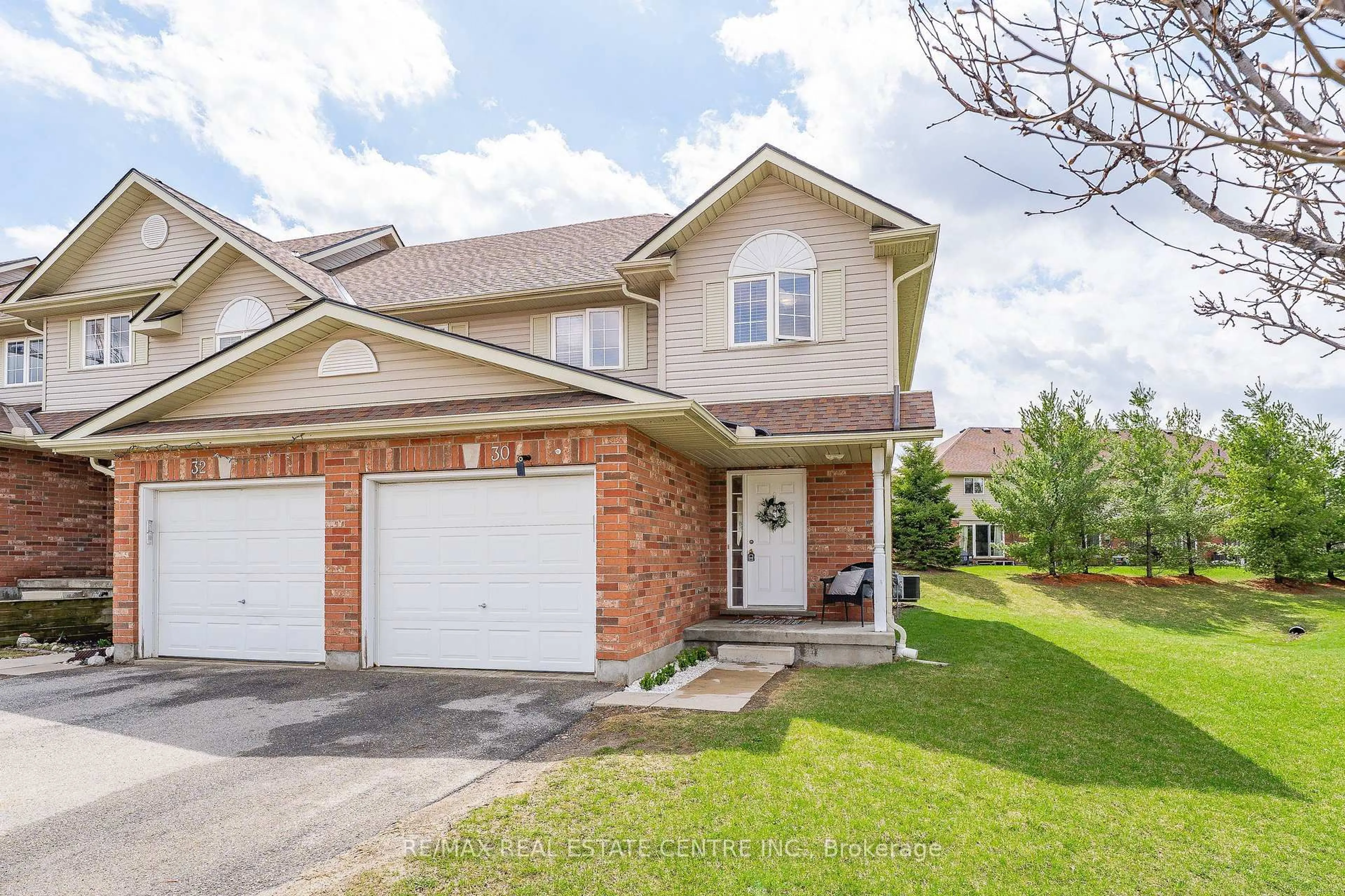 Home with brick exterior material, street for 30 Fallowfield Dr, Kitchener Ontario N2C 0A8