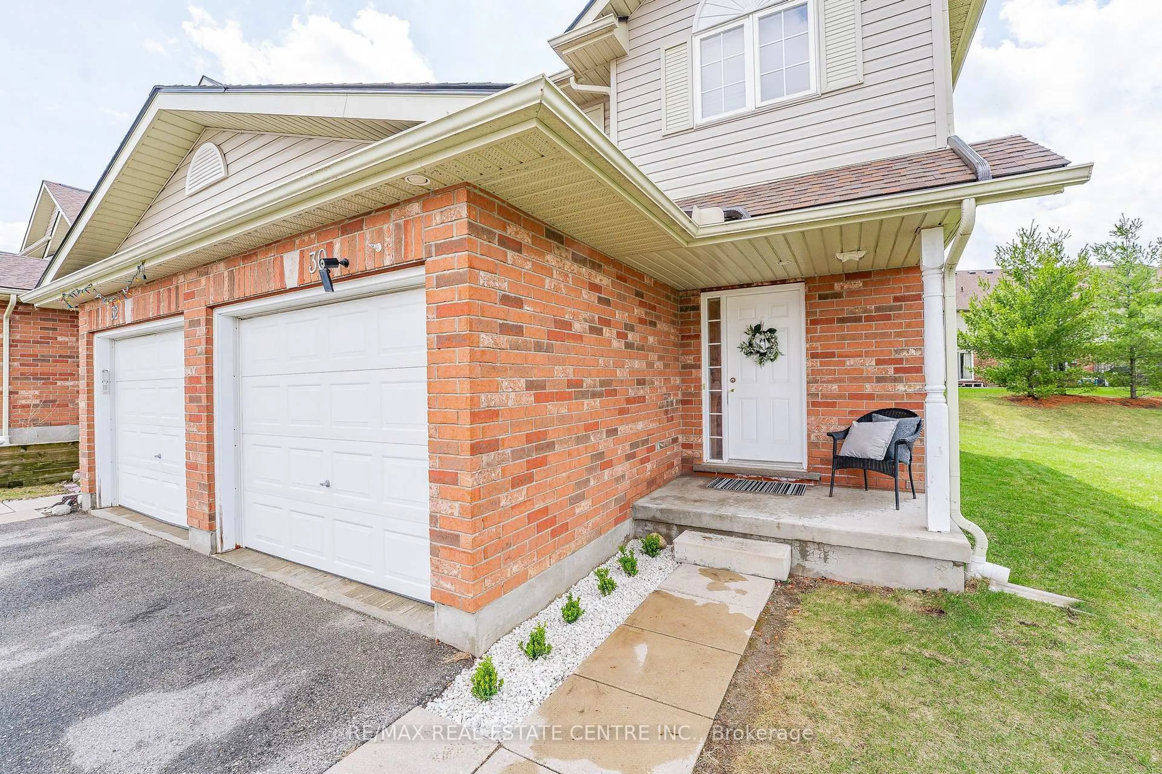 Home with brick exterior material, street for 30 Fallowfield Dr, Kitchener Ontario N2C 0A8