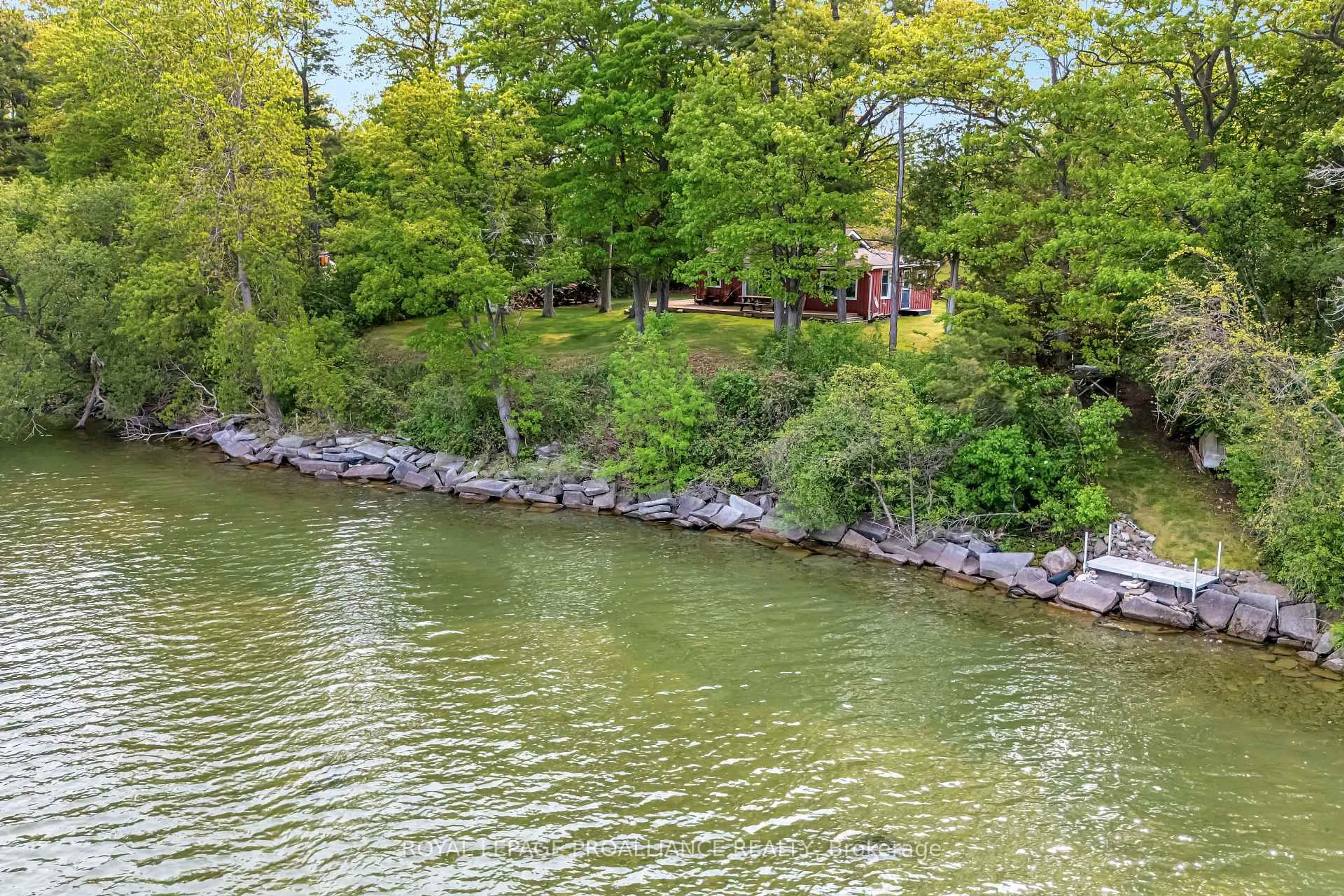 A pic from outside/outdoor area/front of a property/back of a property/a pic from drone, water/lake/river/ocean view for 27 Thrush Lane, Prince Edward County Ontario K0K 2T0