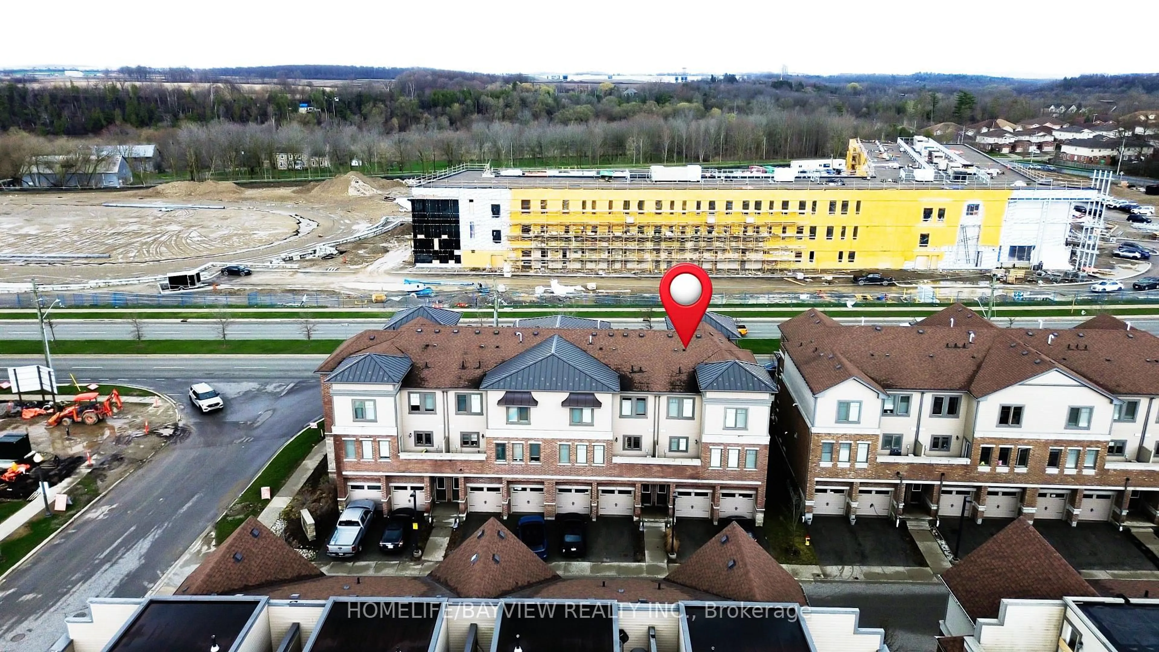 A pic from outside/outdoor area/front of a property/back of a property/a pic from drone, building for 70 Willowrun Dr #B1, Kitchener Ontario N2A 0J3