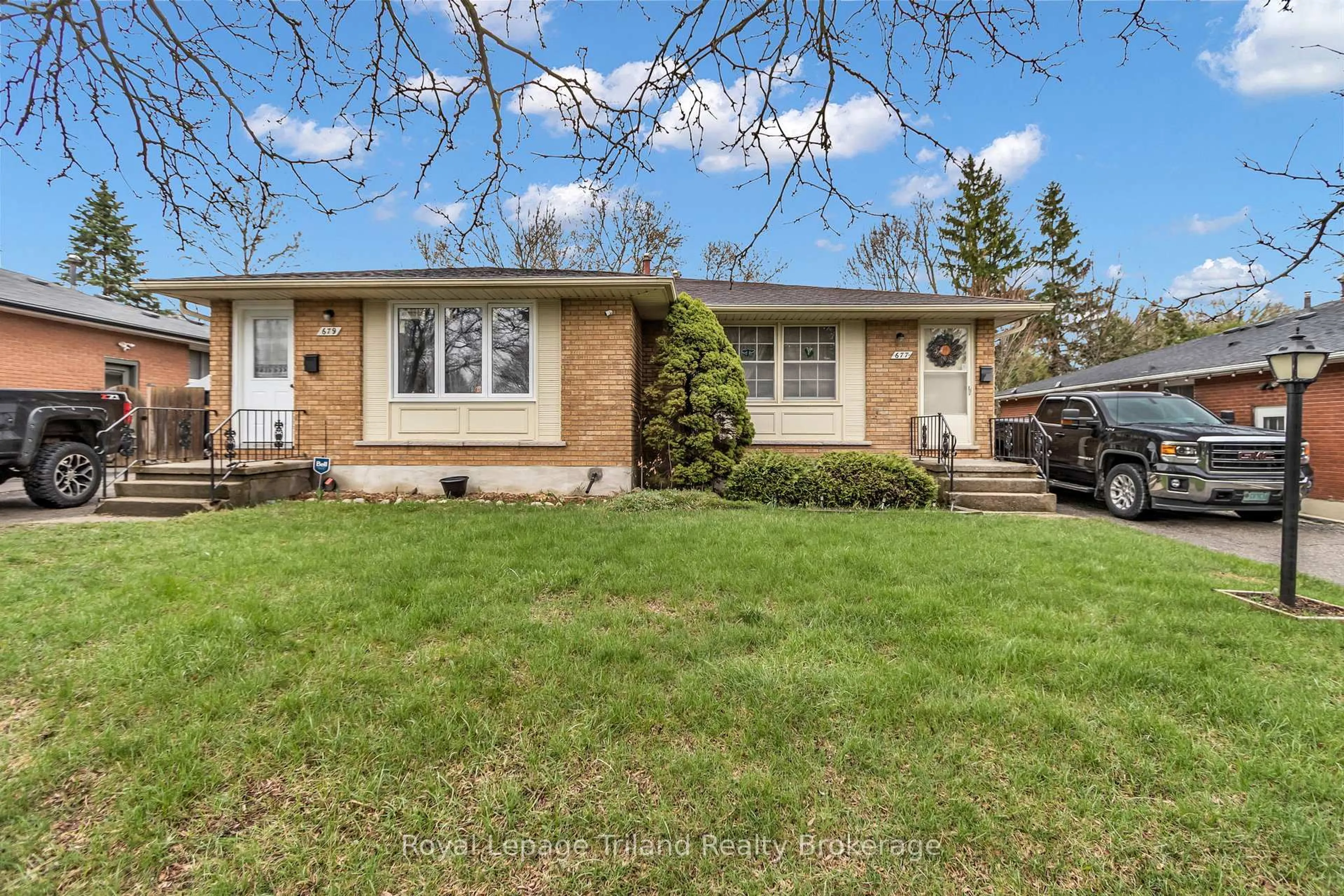 Home with vinyl exterior material, street for 677 & 679 Sevilla Park Pl, London East Ontario N5Y 4H9