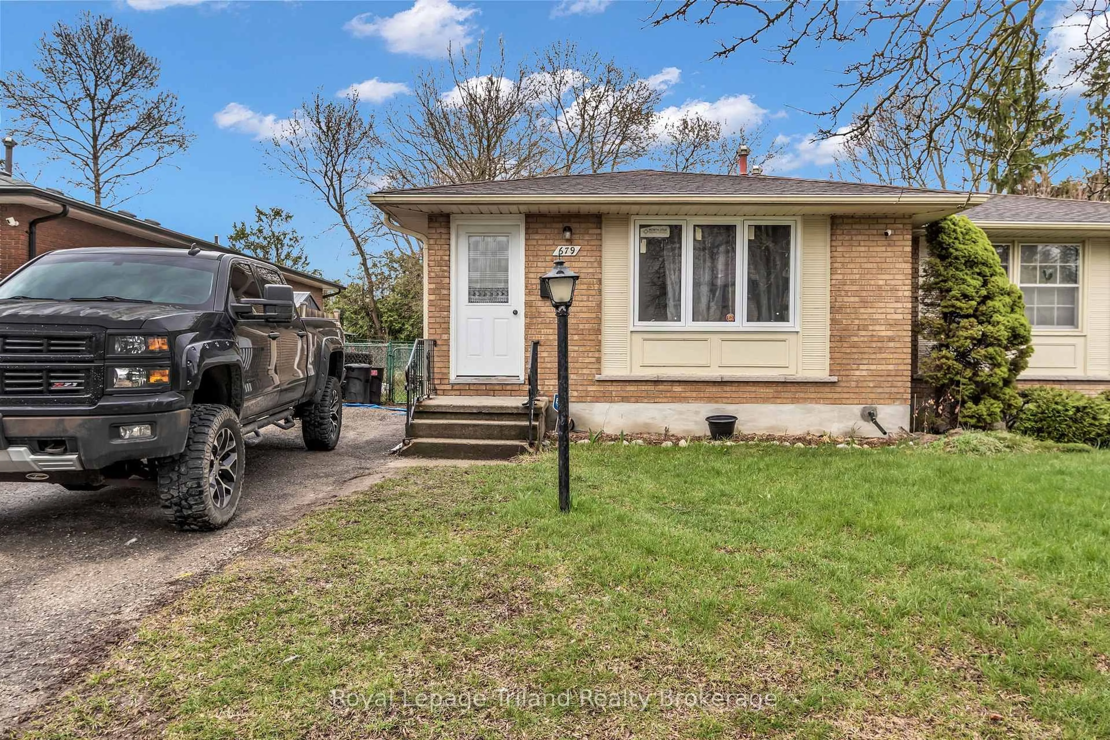 Home with brick exterior material, street for 677 & 679 Sevilla Park Pl, London East Ontario N5Y 4H9