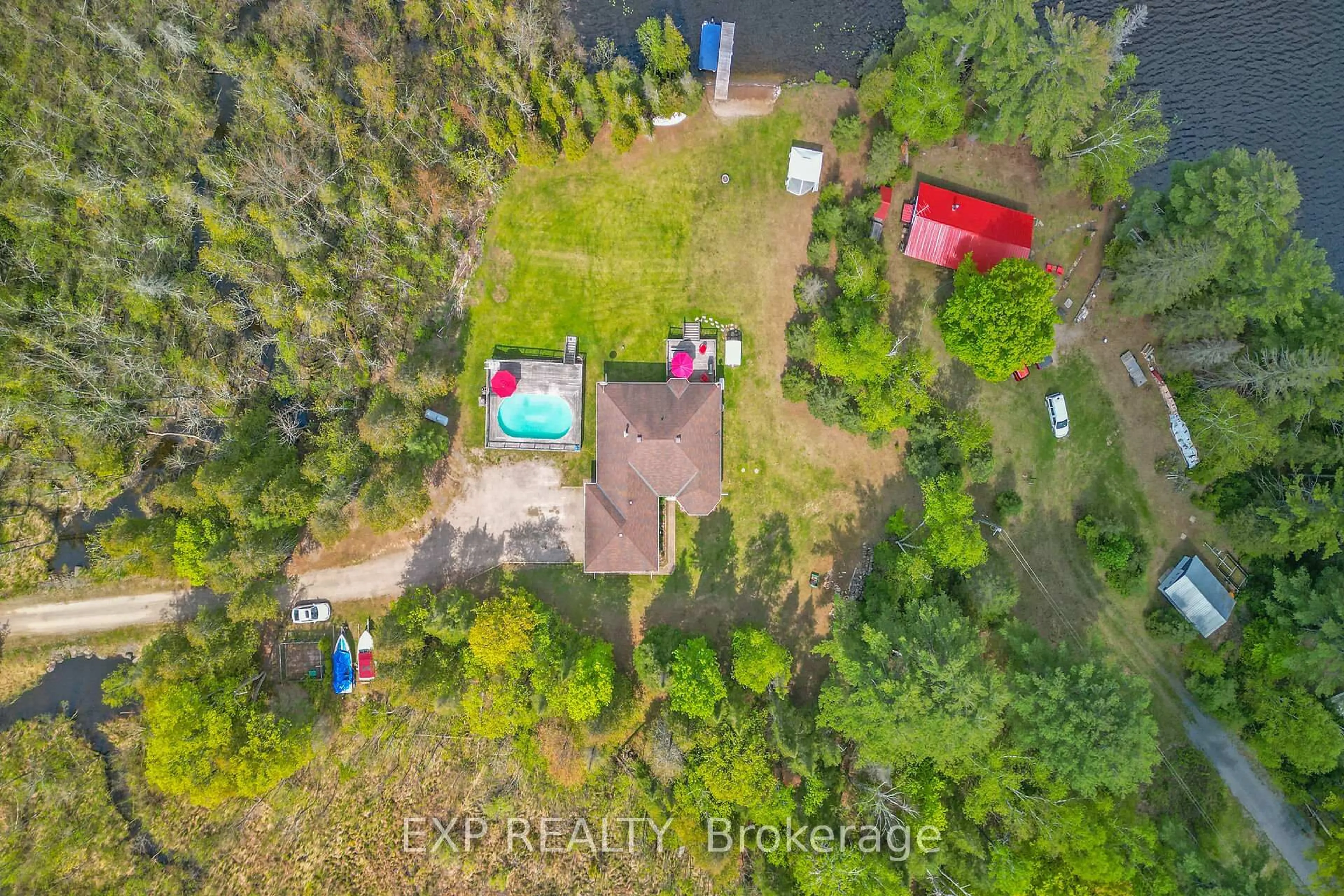A pic from outside/outdoor area/front of a property/back of a property/a pic from drone, water/lake/river/ocean view for 2186 Clyde Lake Rd, Lanark Ontario K0G 1K0