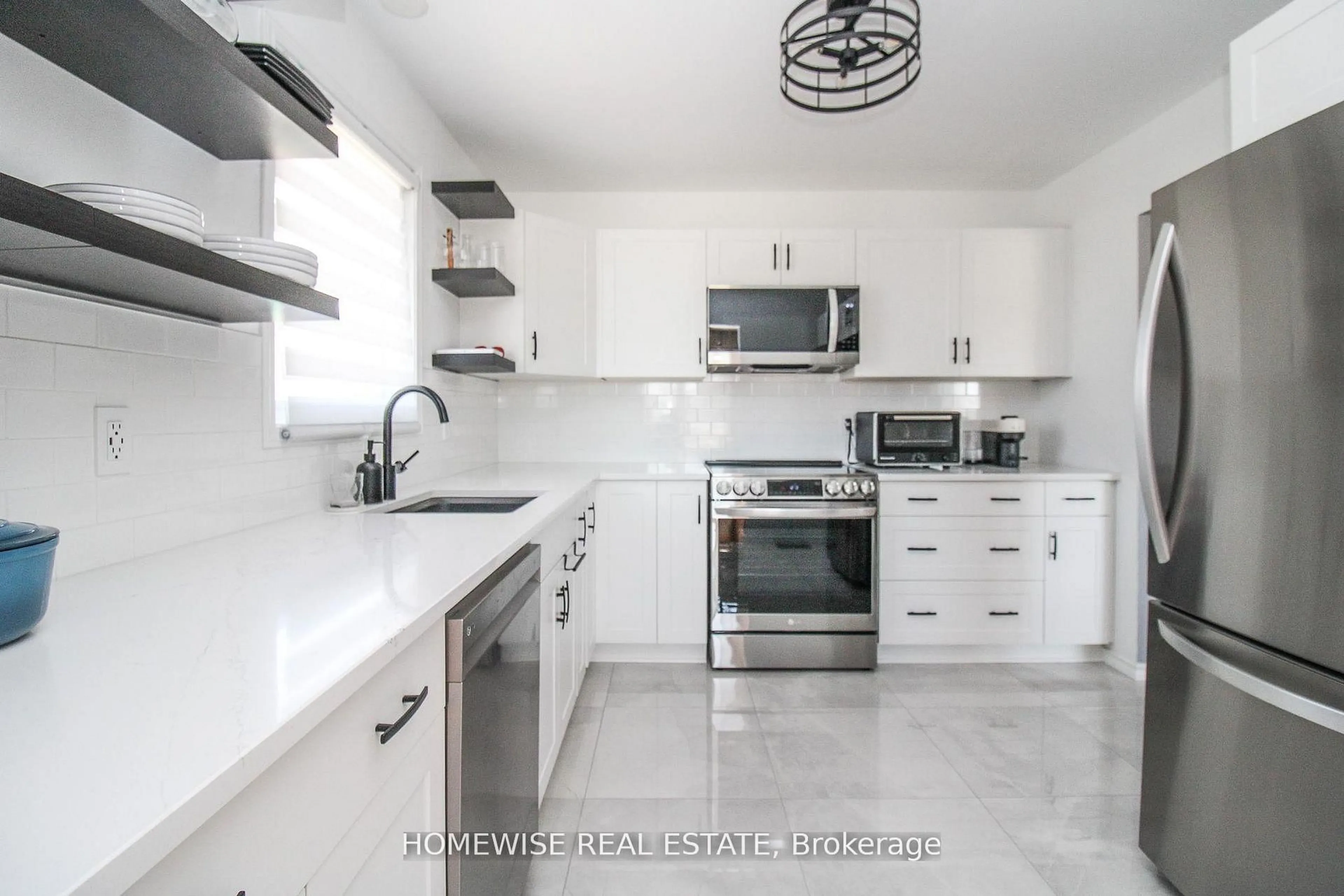 Open concept kitchen, ceramic/tile floor for 268 SPENCLEYS Lane, Peterborough Ontario K9H 1S3