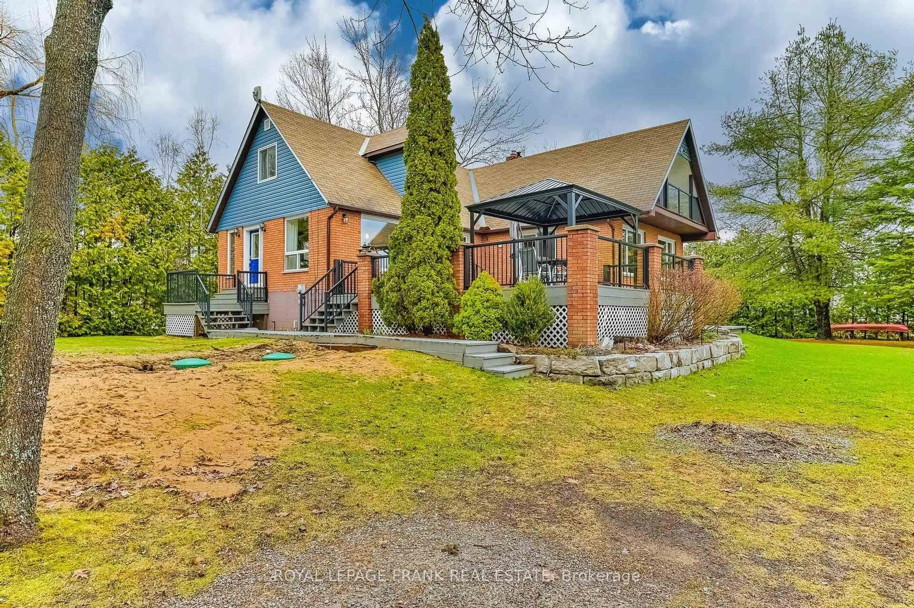 A pic from outside/outdoor area/front of a property/back of a property/a pic from drone, street for 14 Fire Route 26B, Trent Lakes Ontario K0L 1J0