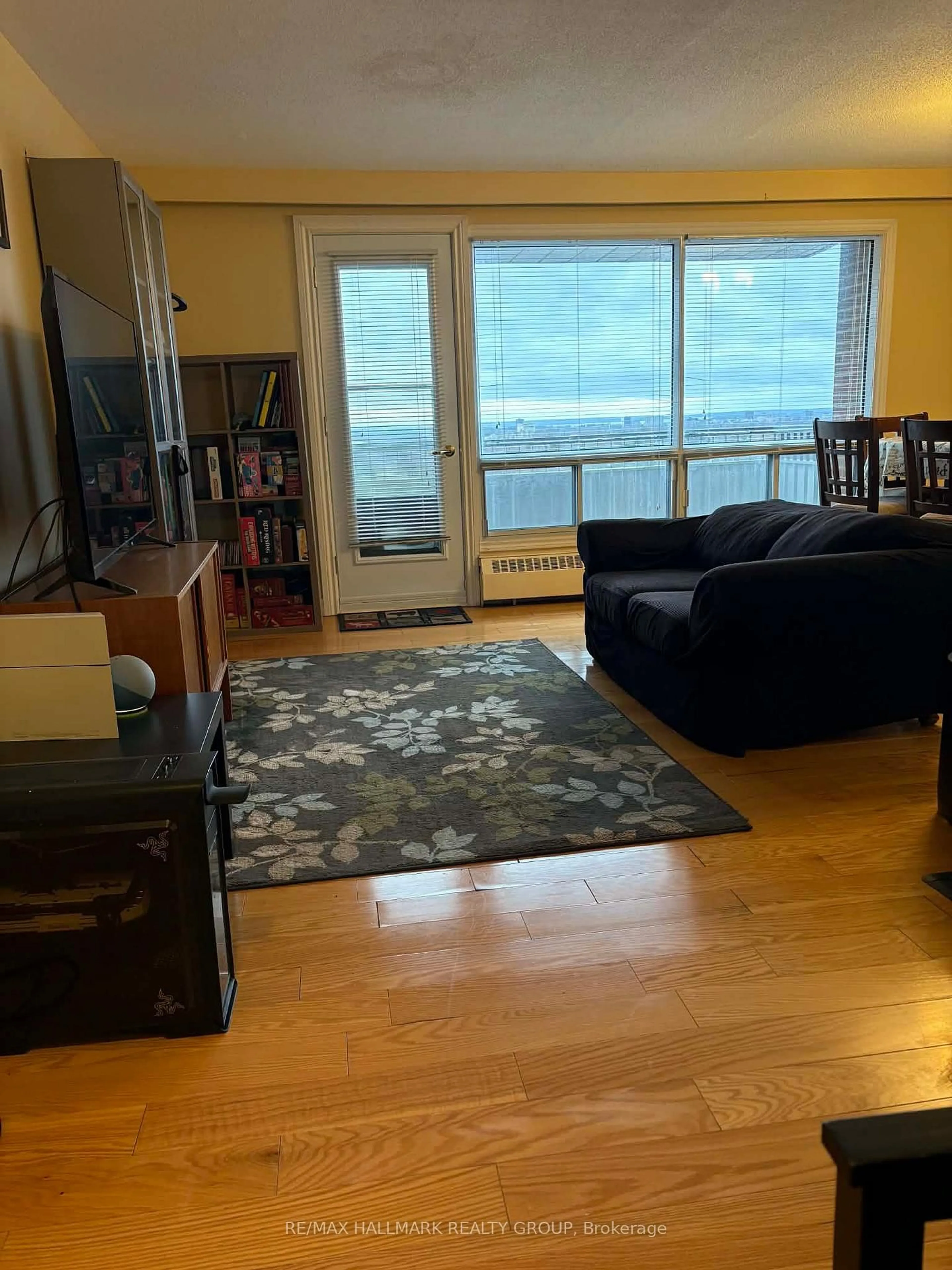 Living room with furniture, unknown for 20 Chesterton Dr #1217, Ottawa Ontario K2E 6Z7