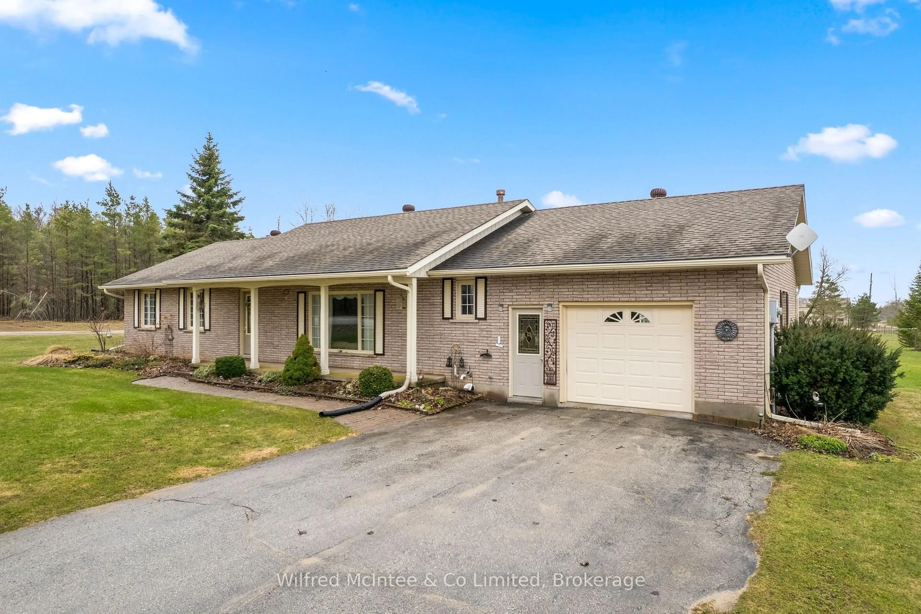 A pic from outside/outdoor area/front of a property/back of a property/a pic from drone, street for 333424 Concession 1, West Grey Ontario N0G 1R0