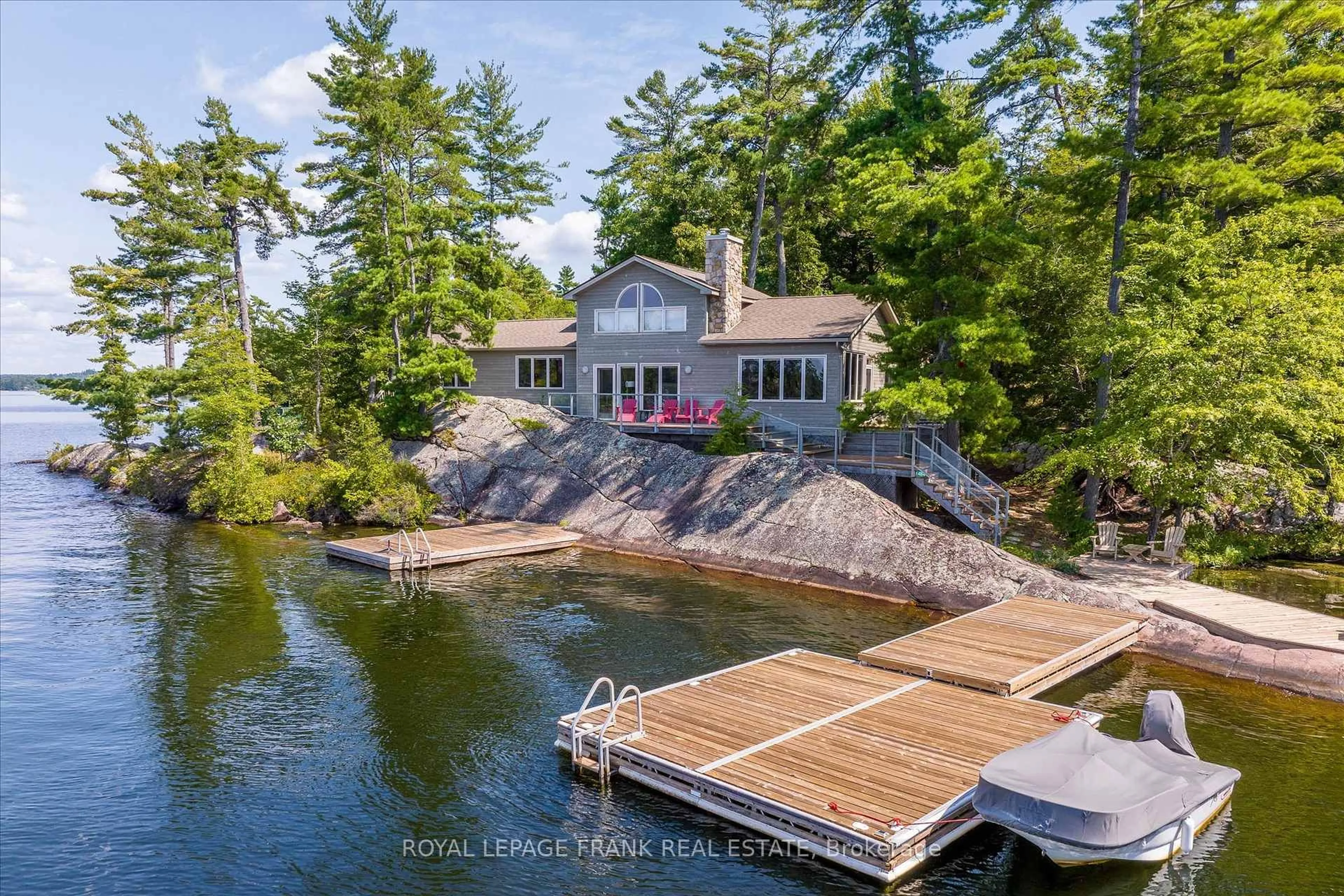 A pic from outside/outdoor area/front of a property/back of a property/a pic from drone, water/lake/river/ocean view for 484 Juniper Island, Douro-Dummer Ontario K0L 2C0