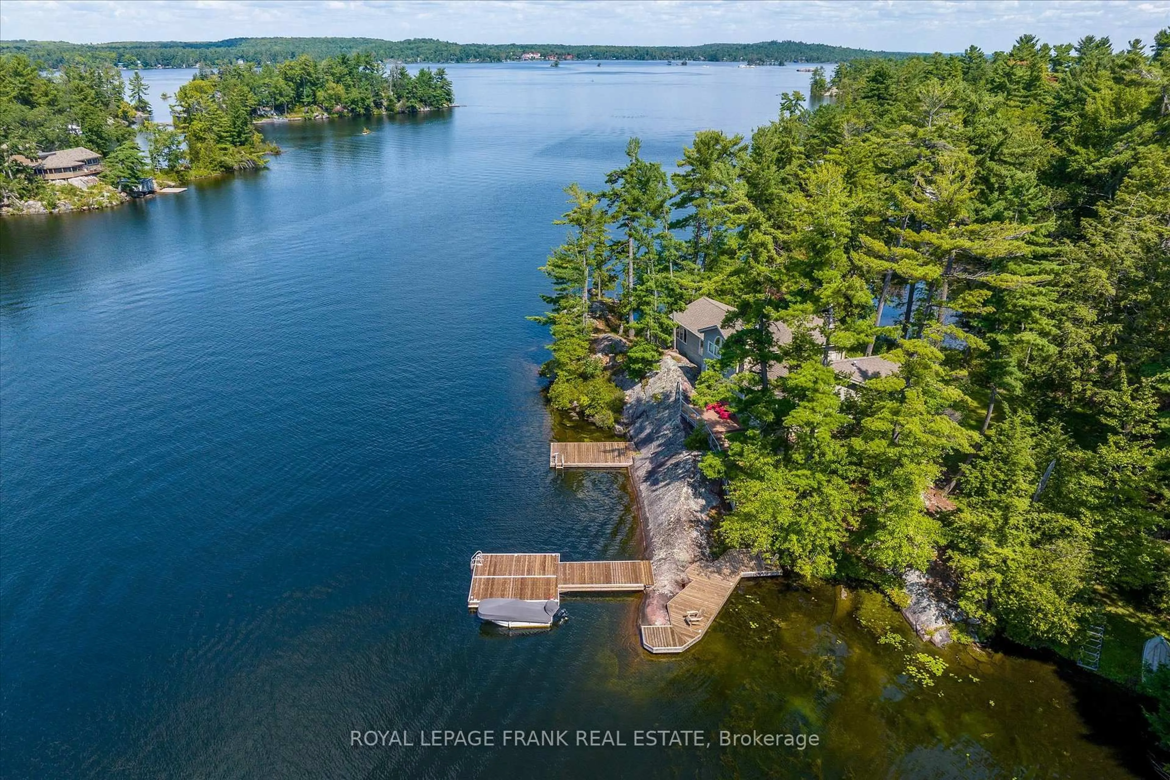 A pic from outside/outdoor area/front of a property/back of a property/a pic from drone, water/lake/river/ocean view for 484 Juniper Island, Douro-Dummer Ontario K0L 2C0