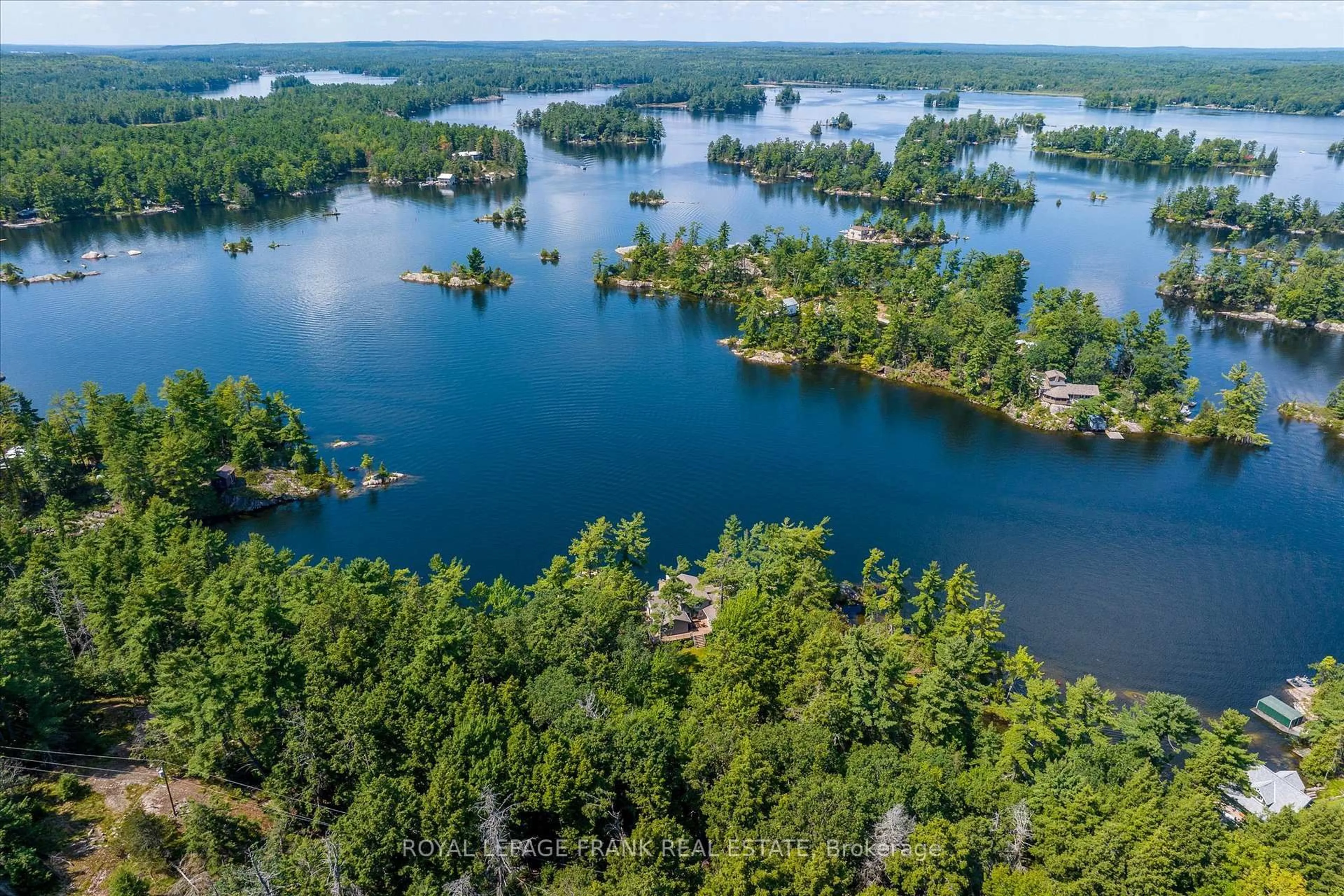 A pic from outside/outdoor area/front of a property/back of a property/a pic from drone, water/lake/river/ocean view for 484 Juniper Island, Douro-Dummer Ontario K0L 2C0