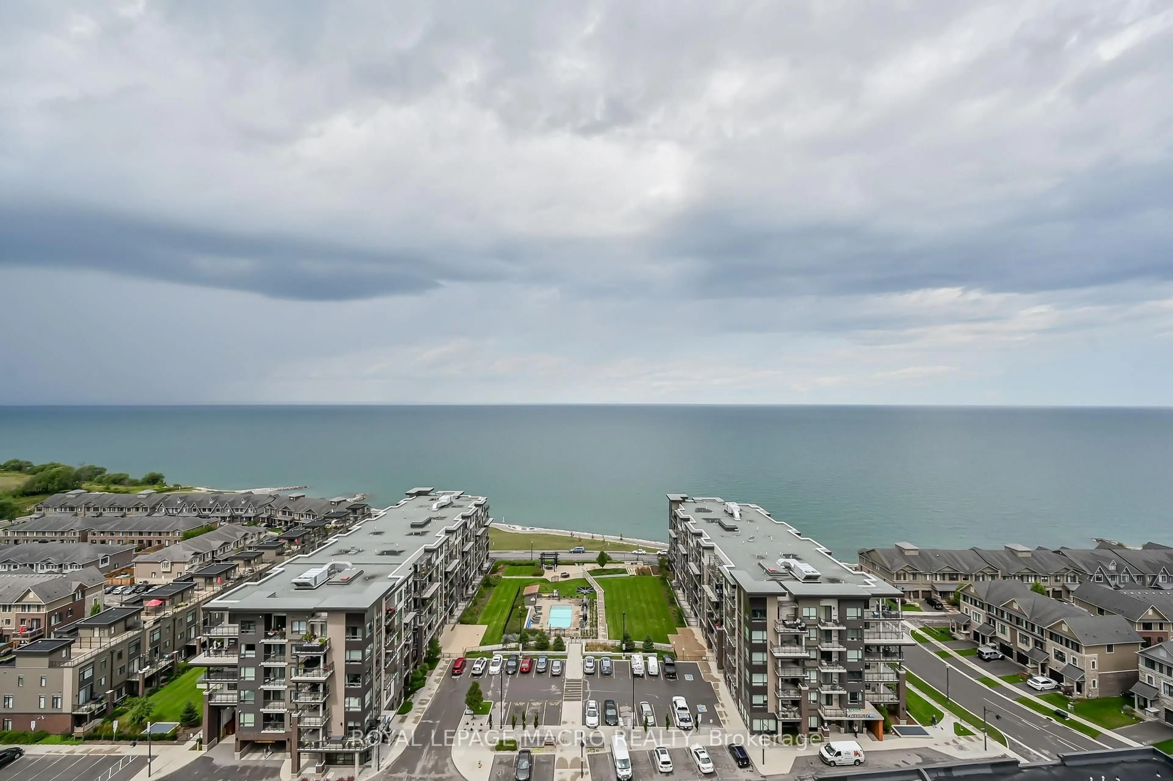 A pic from outside/outdoor area/front of a property/back of a property/a pic from drone, water/lake/river/ocean view for 385 Winston Rd #1607, Grimsby Ontario L3M 4E8