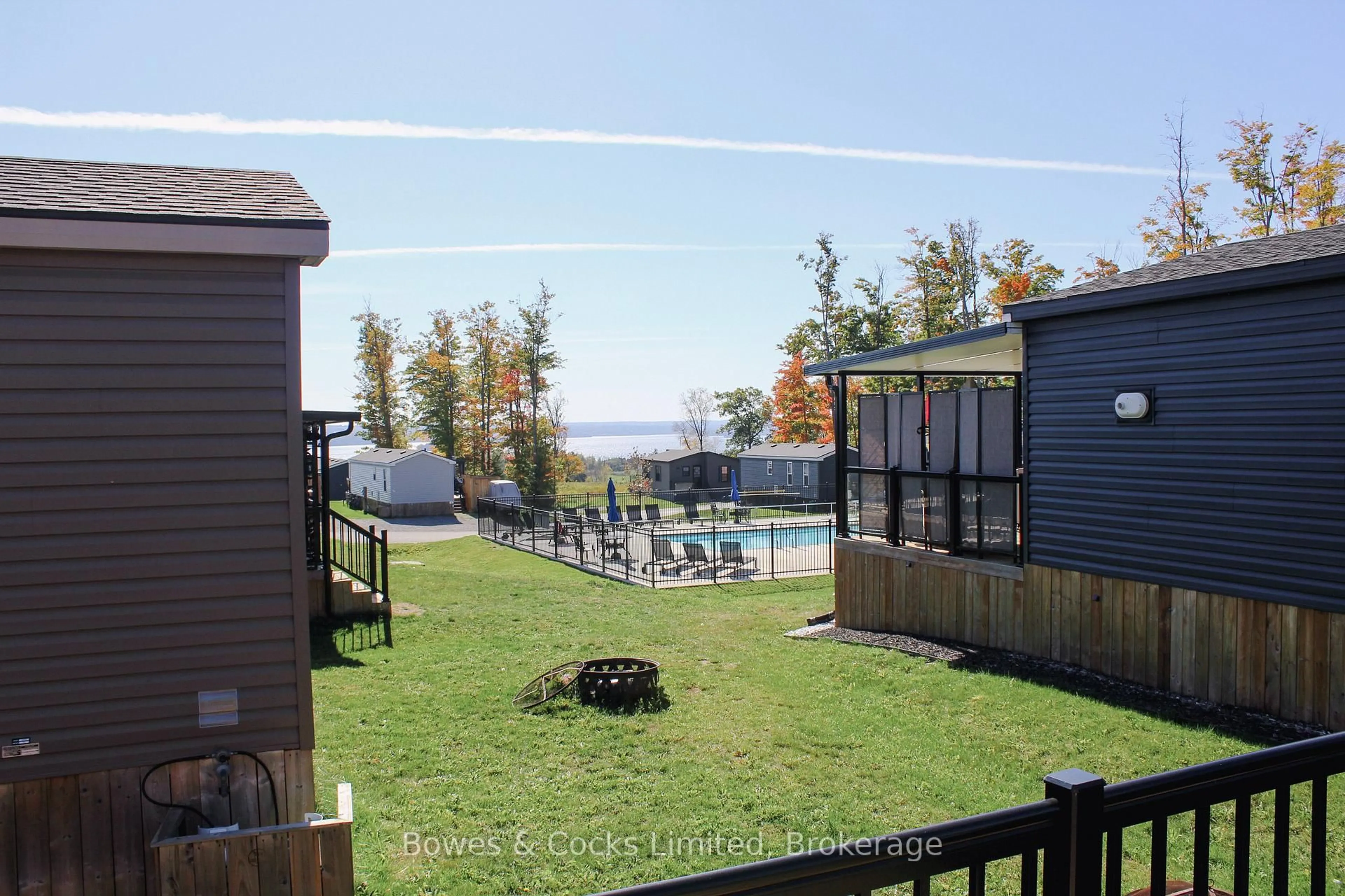 A pic from outside/outdoor area/front of a property/back of a property/a pic from drone, water/lake/river/ocean view for 1235 Villiers Line #10 Lambton, Otonabee-South Monaghan Ontario K0L 2G0