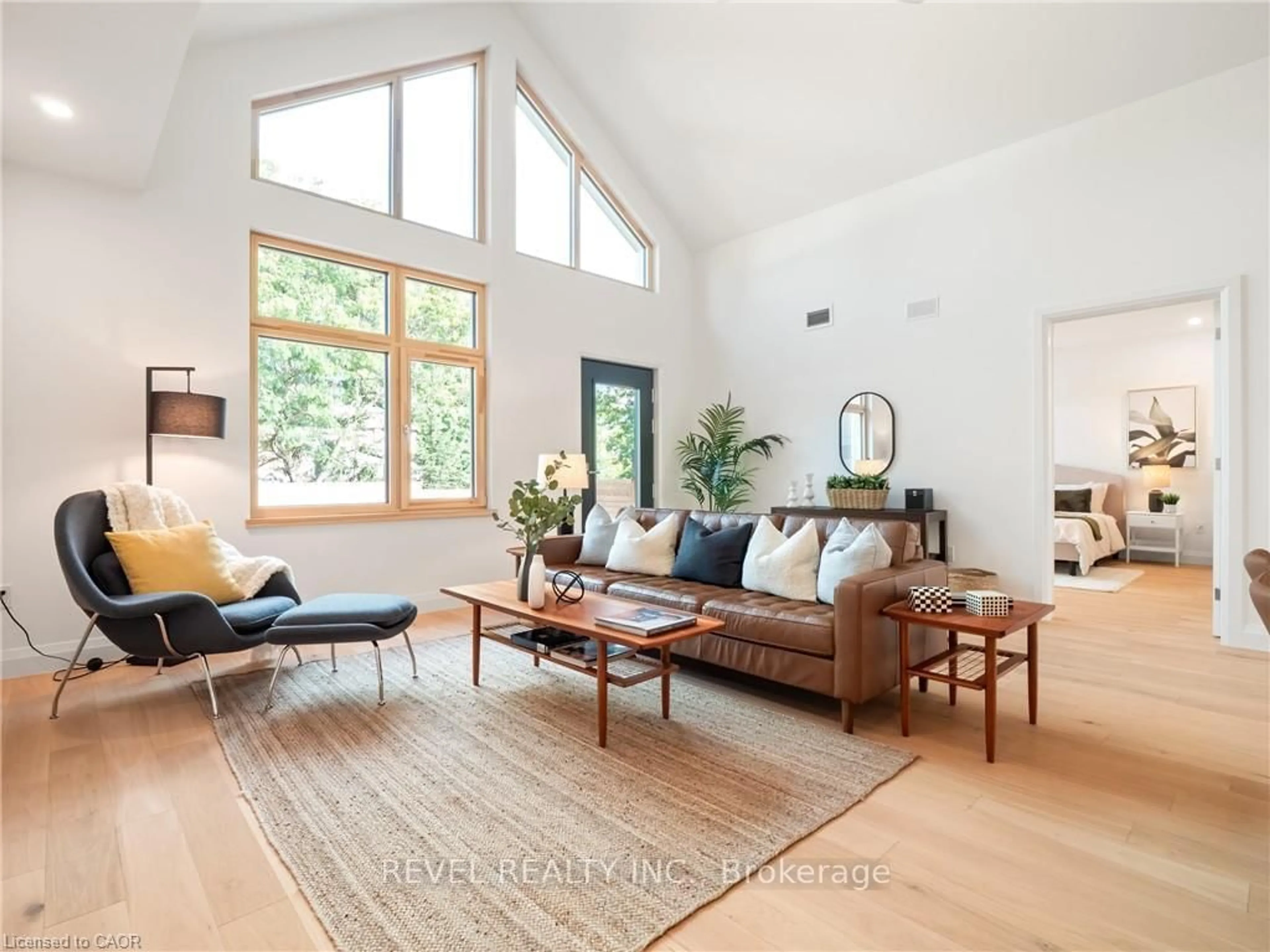 Living room with furniture, wood/laminate floor for 98 Elgin St, Zorra Ontario N0J 1J0