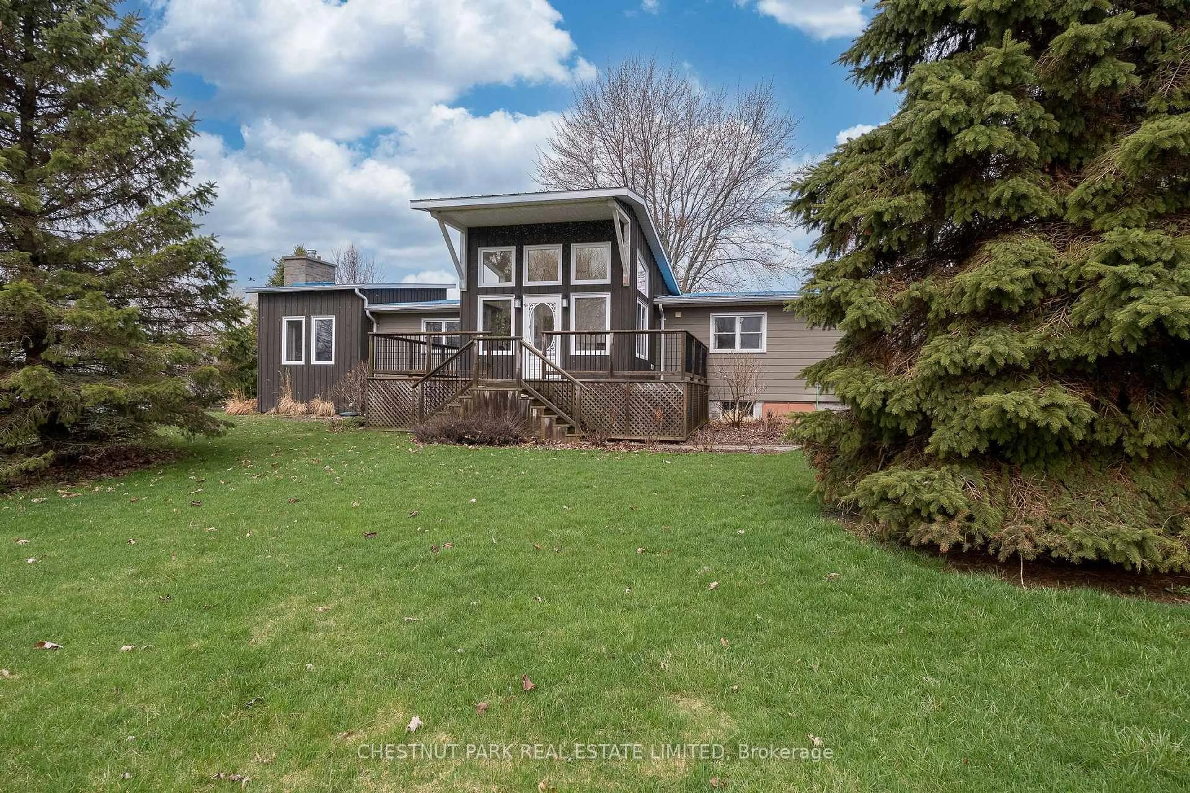 Home with vinyl exterior material, street for 27 Carmans Lane, Prince Edward County Ontario K0K 2T0