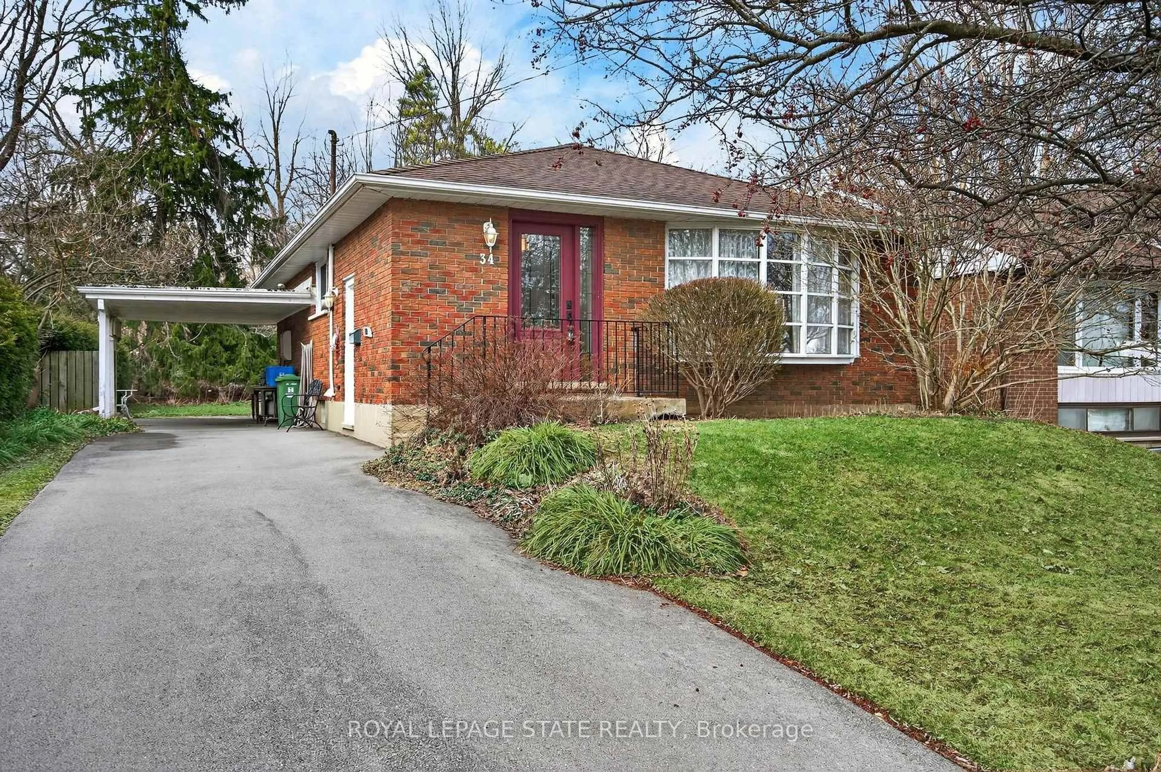 Home with brick exterior material, street for 34 Helen St, Hamilton Ontario L9H 1N3