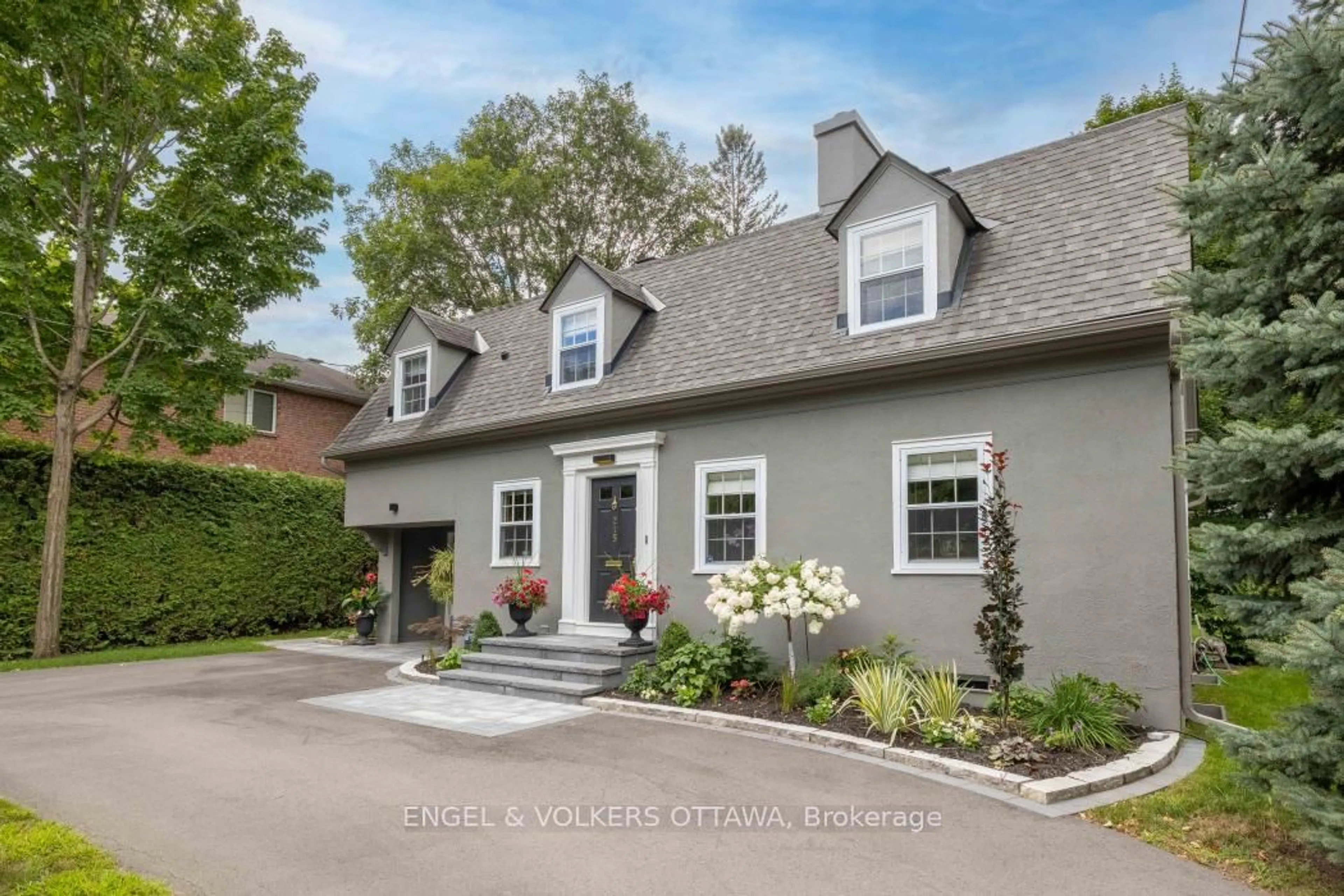 Home with brick exterior material, street for 215 Springfield Rd, Ottawa Ontario K1M 0L1