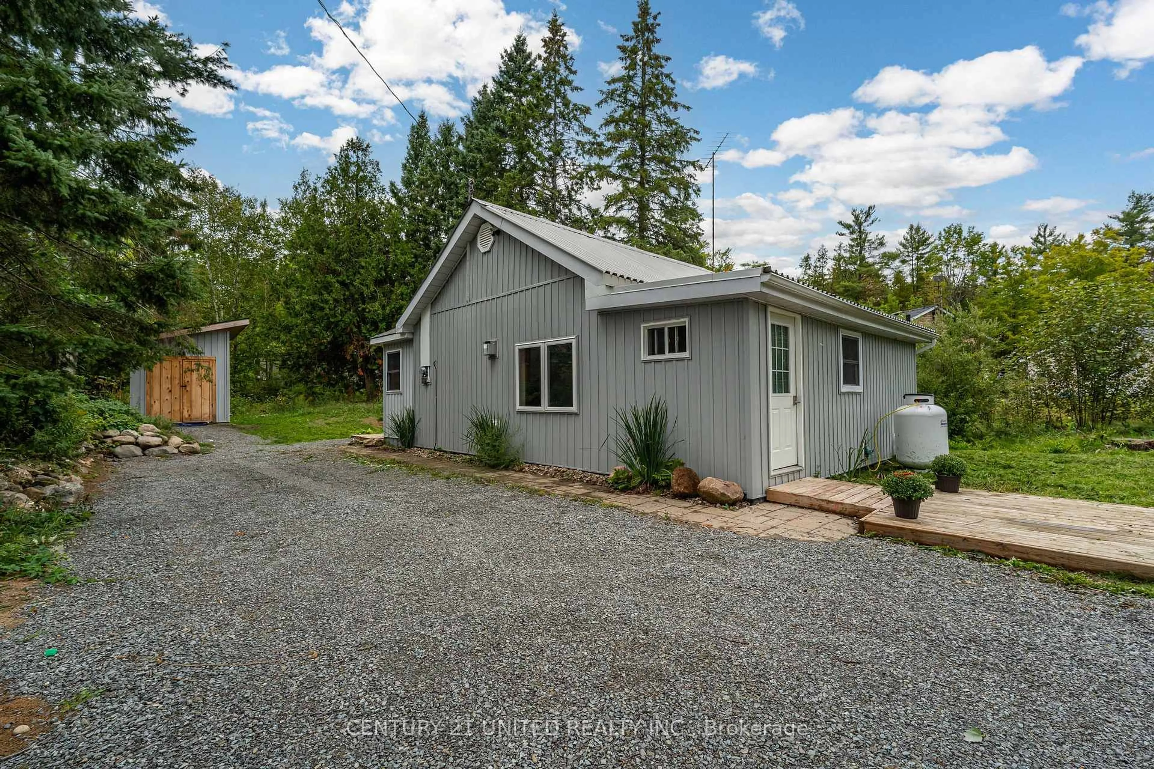 A pic from outside/outdoor area/front of a property/back of a property/a pic from drone, street for 8186 Highway 28, North Kawartha Ontario K0L 1A0