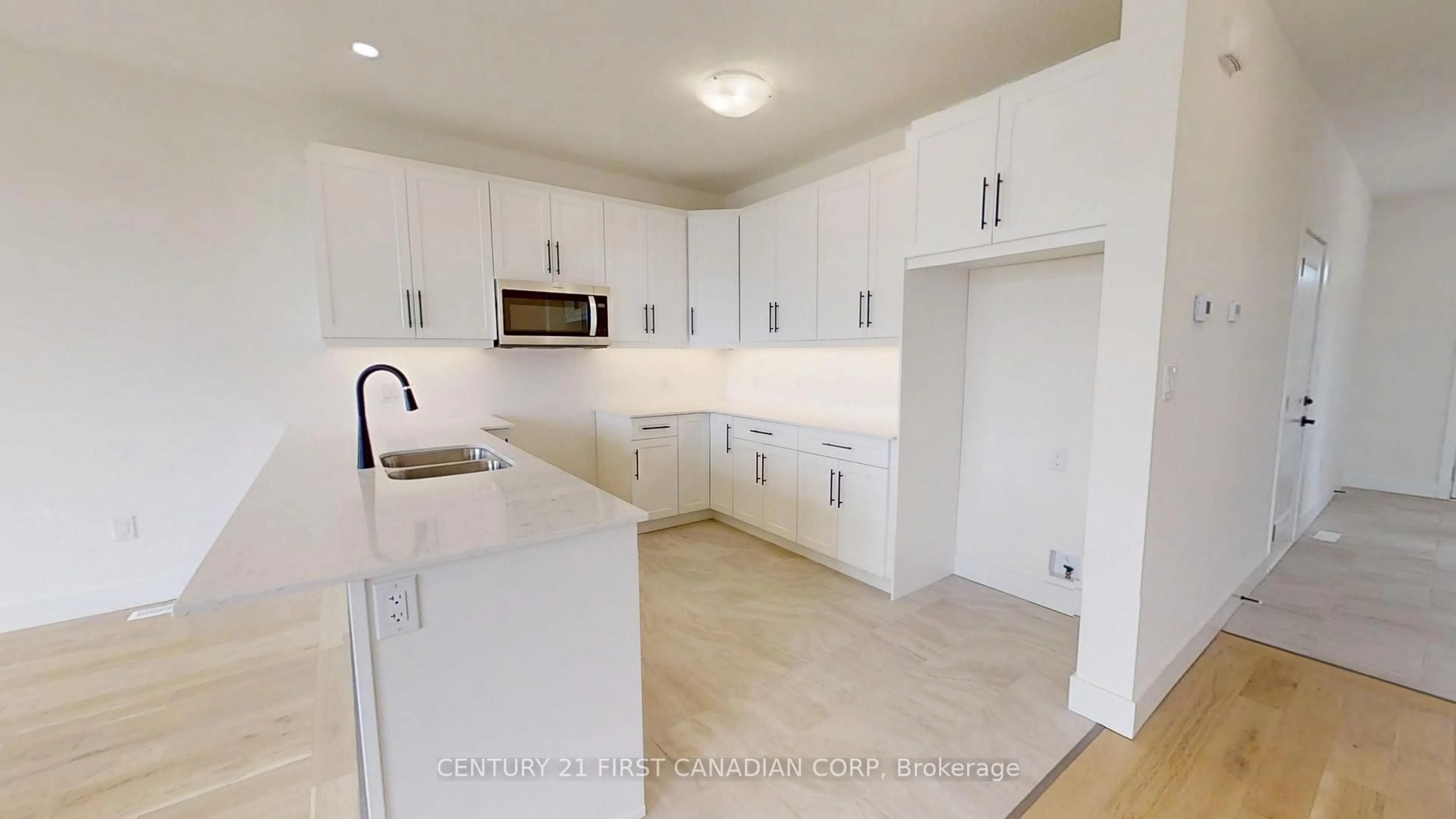 Open concept kitchen, ceramic/tile floor for 1217 Tulloch Ave, London South Ontario N6M 0L8