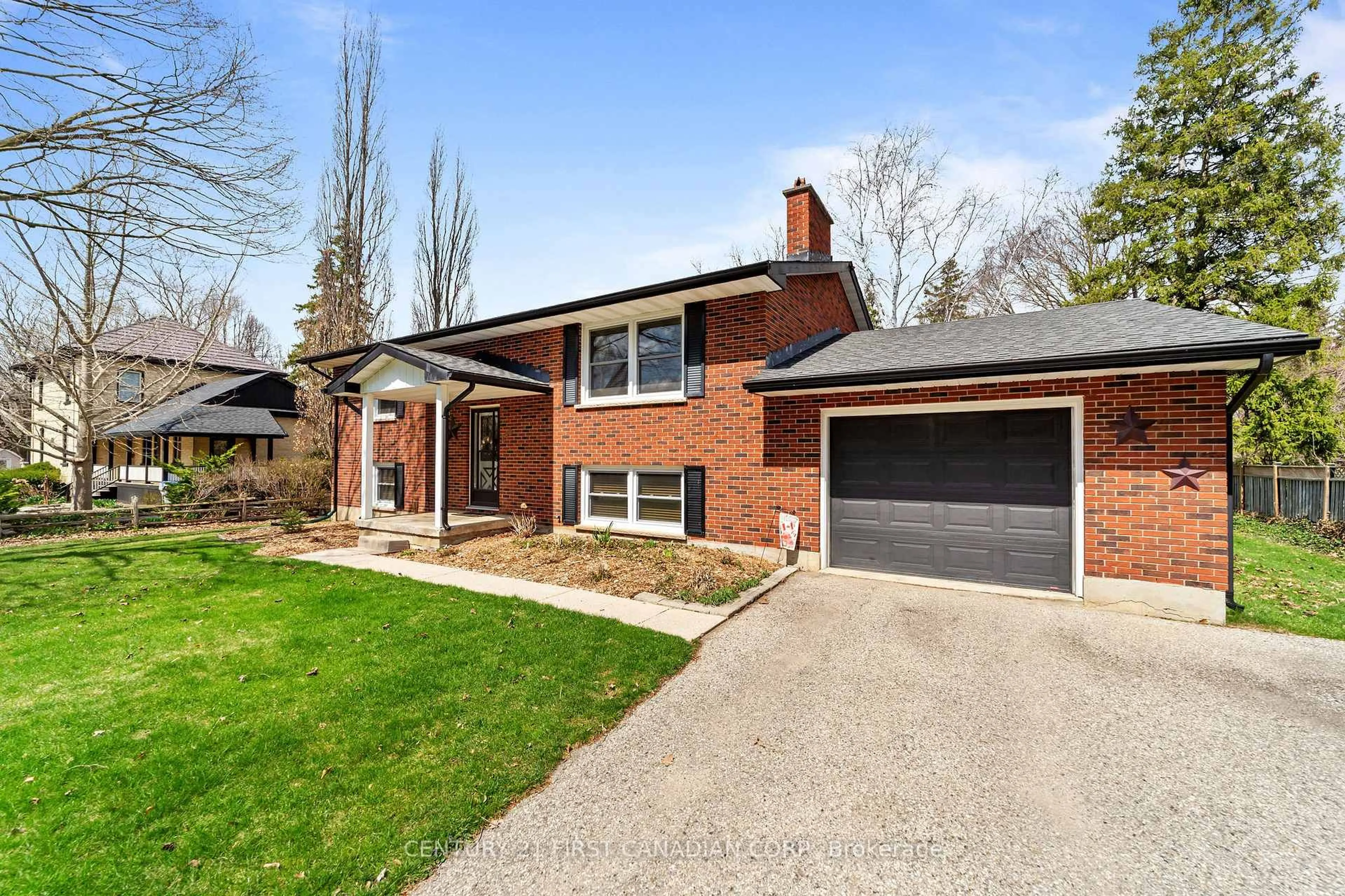 Home with brick exterior material, street for 180 Church St, North Middlesex Ontario N0M 1A0