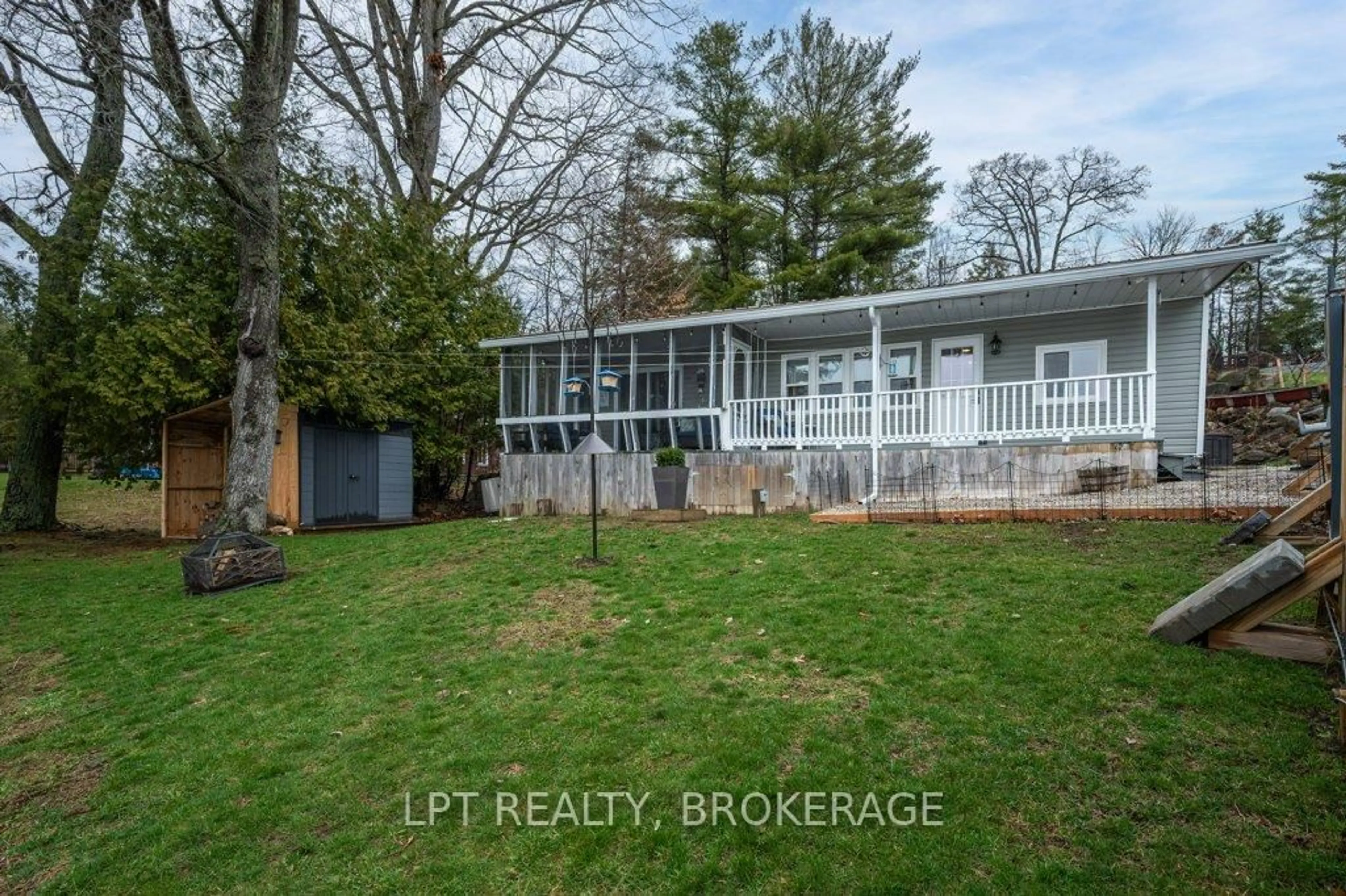 A pic from outside/outdoor area/front of a property/back of a property/a pic from drone, water/lake/river/ocean view for 805 Cartwrights Lane, Leeds and the Thousand Islands Ontario K0H 2N0