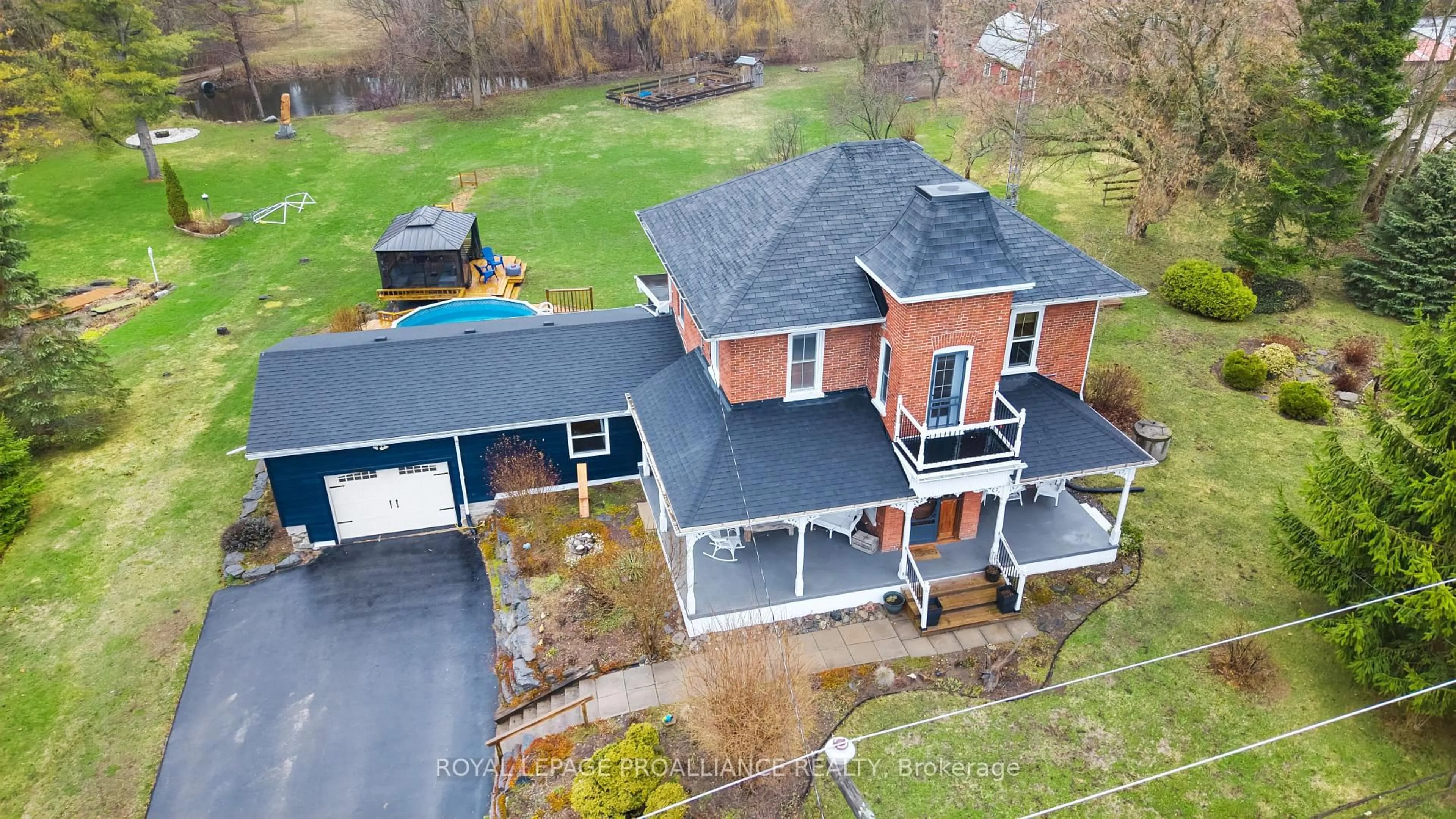 A pic from outside/outdoor area/front of a property/back of a property/a pic from drone, building for 16366 County Road 2 Rd, Trenton Ontario K8V 5P7