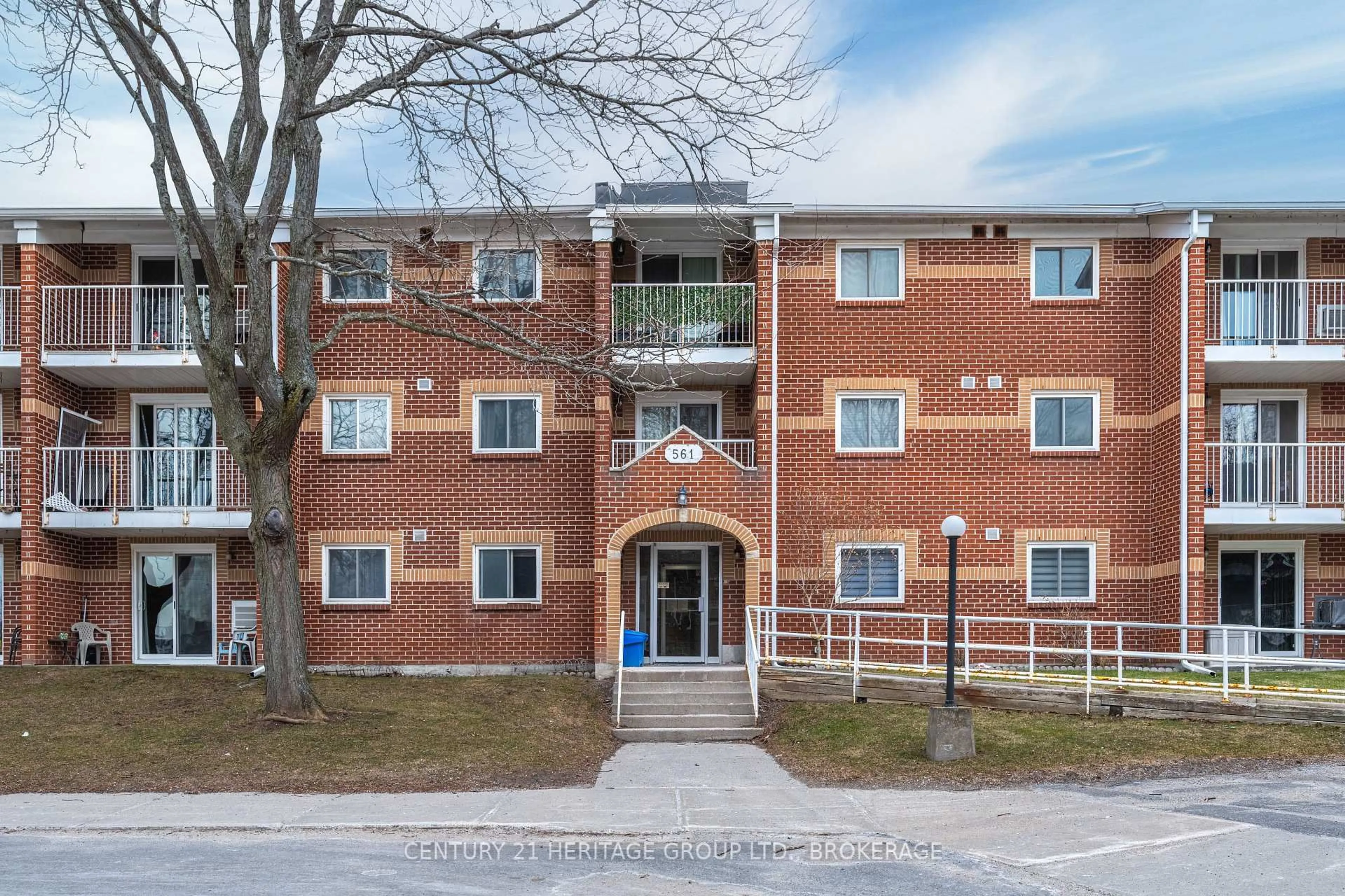 A pic from outside/outdoor area/front of a property/back of a property/a pic from drone, building for 561 Armstrong Rd #202, Kingston Ontario K7M 8J9