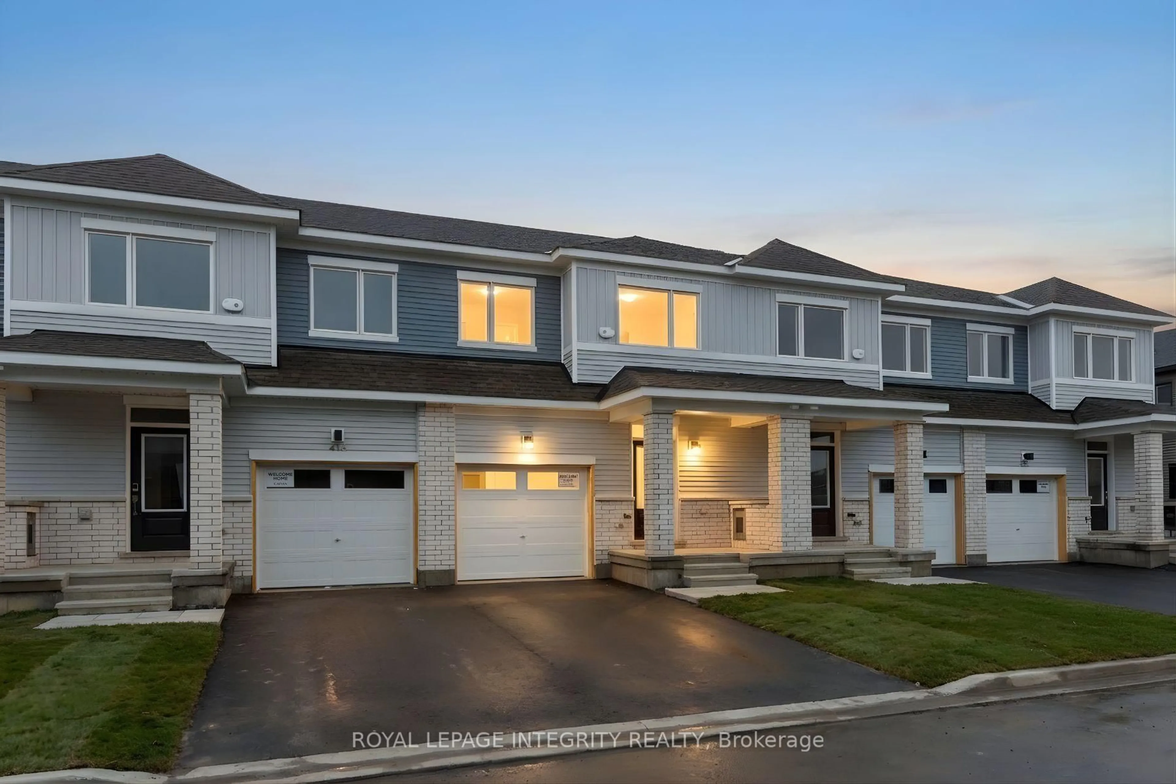 Home with vinyl exterior material, street for 418 Les Emmerson Dr, Ottawa Ontario K2J 4J4