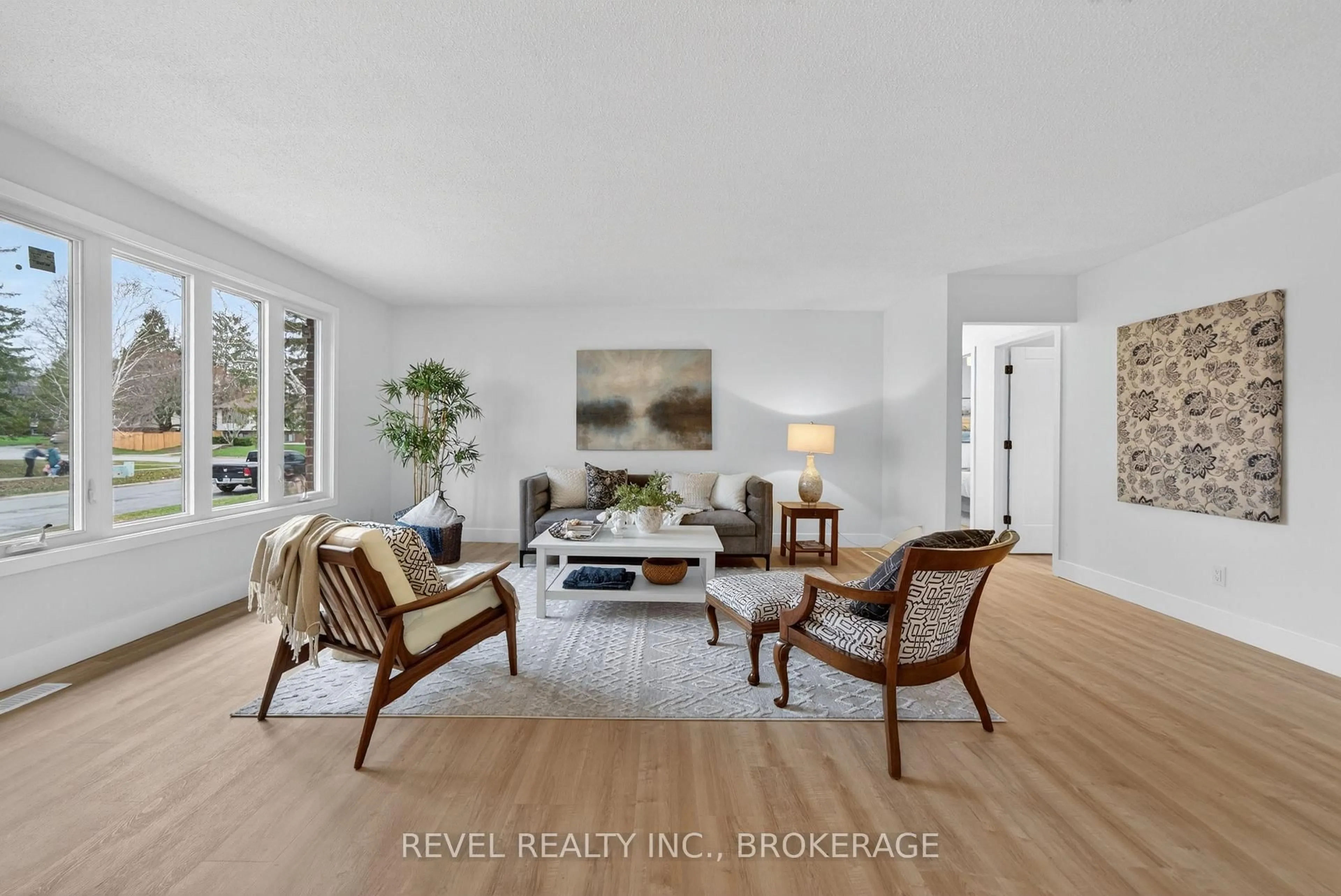 Living room with furniture, wood/laminate floor for 786 Milford Dr, Kingston Ontario K7P 1A8