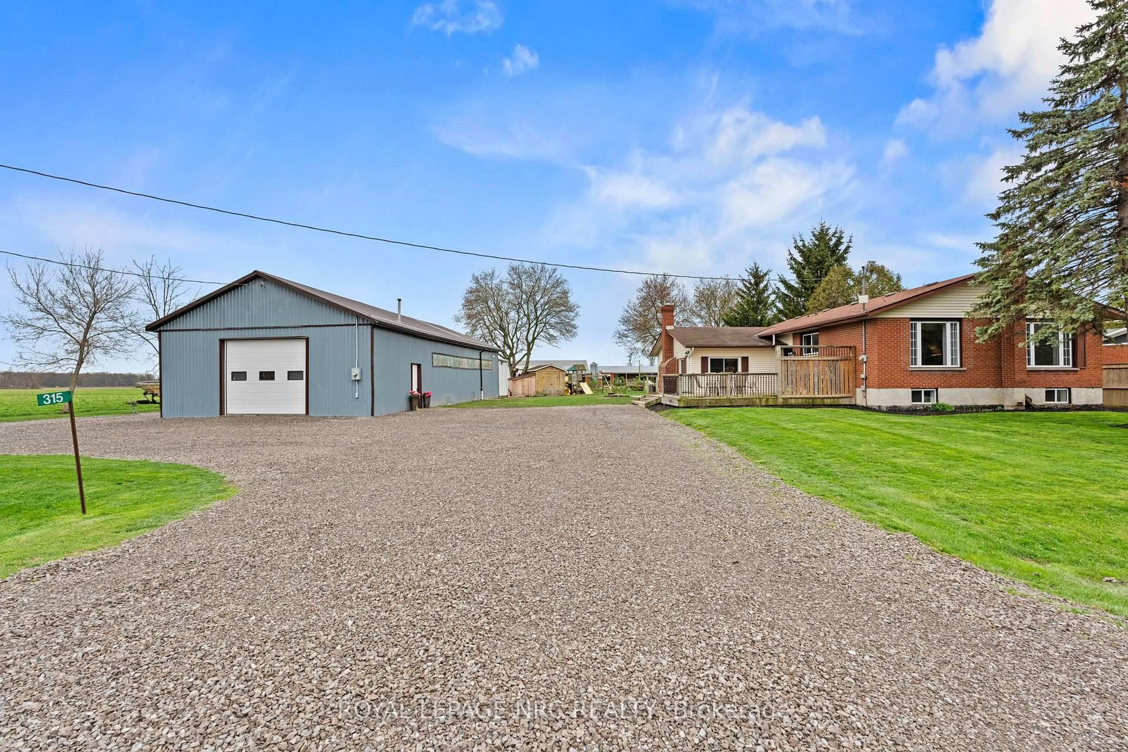 A pic from outside/outdoor area/front of a property/back of a property/a pic from drone, street for 315 Mclaughlin Rd, Haldimand Ontario N1A 2W7