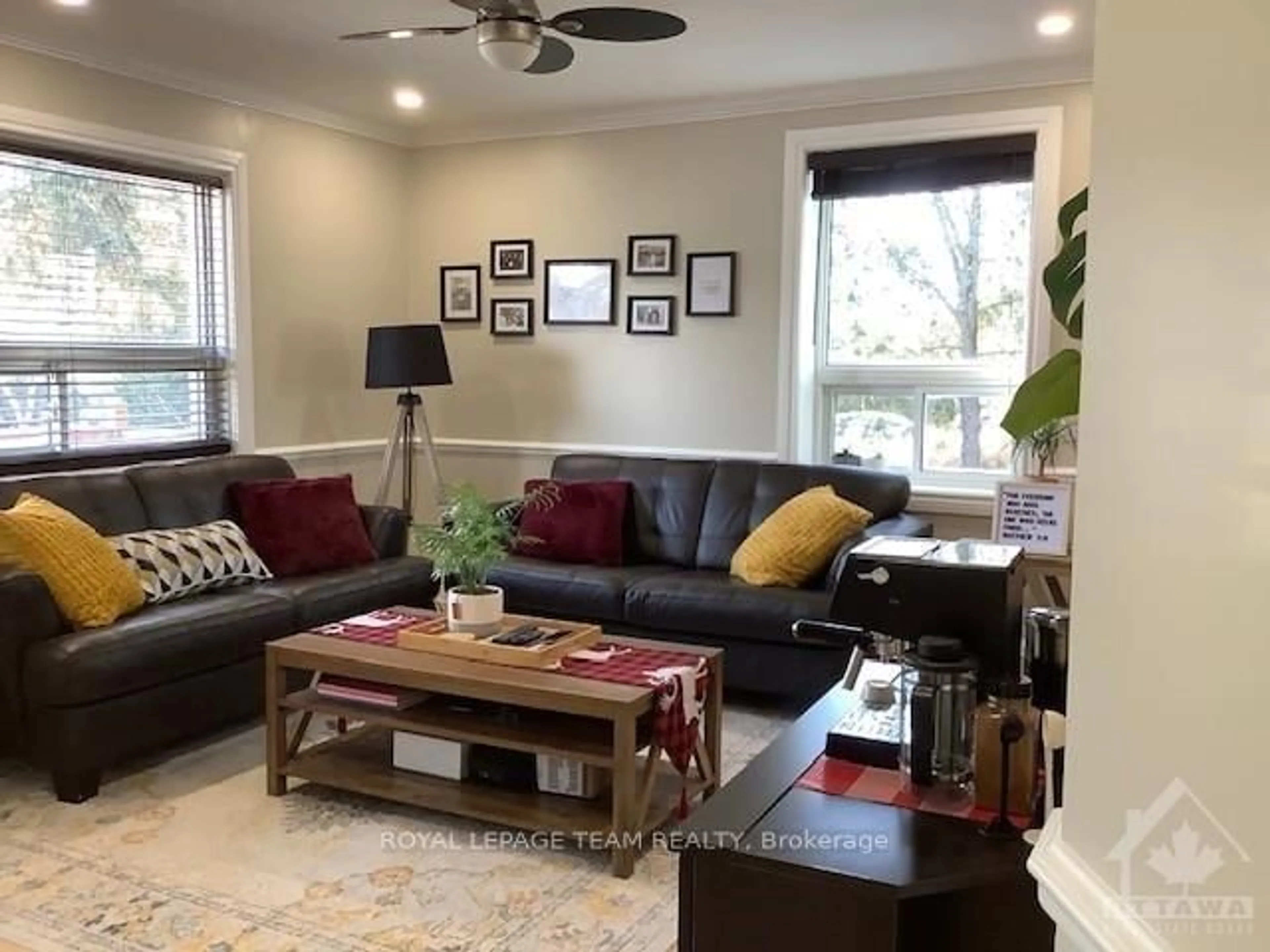 Living room with furniture, wood/laminate floor for 5425 Otto St, Osgoode Ontario K0A 2W0