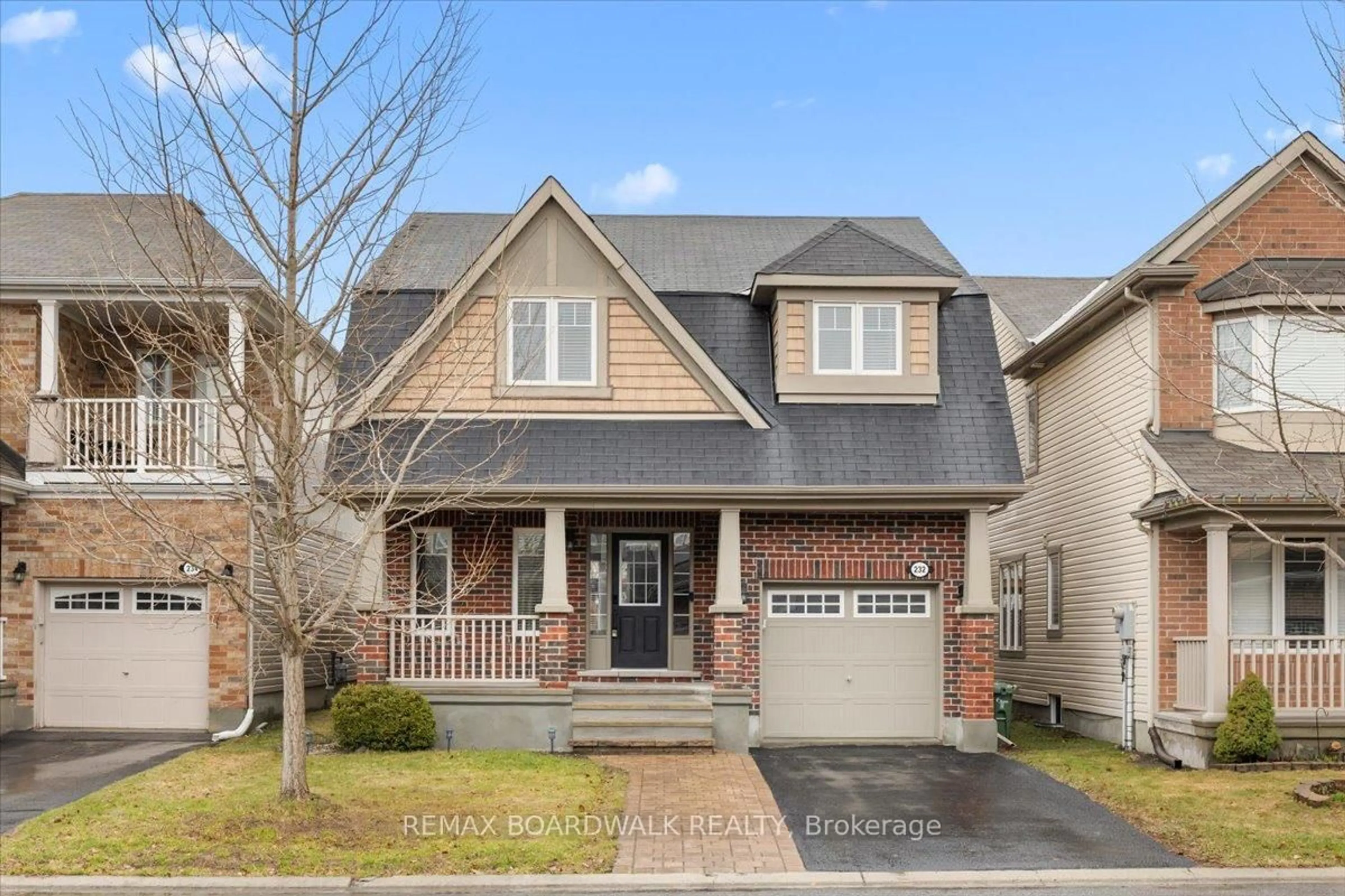 Home with brick exterior material, street for 232 Burnaby Dr, Ottawa Ontario K2S 0J9