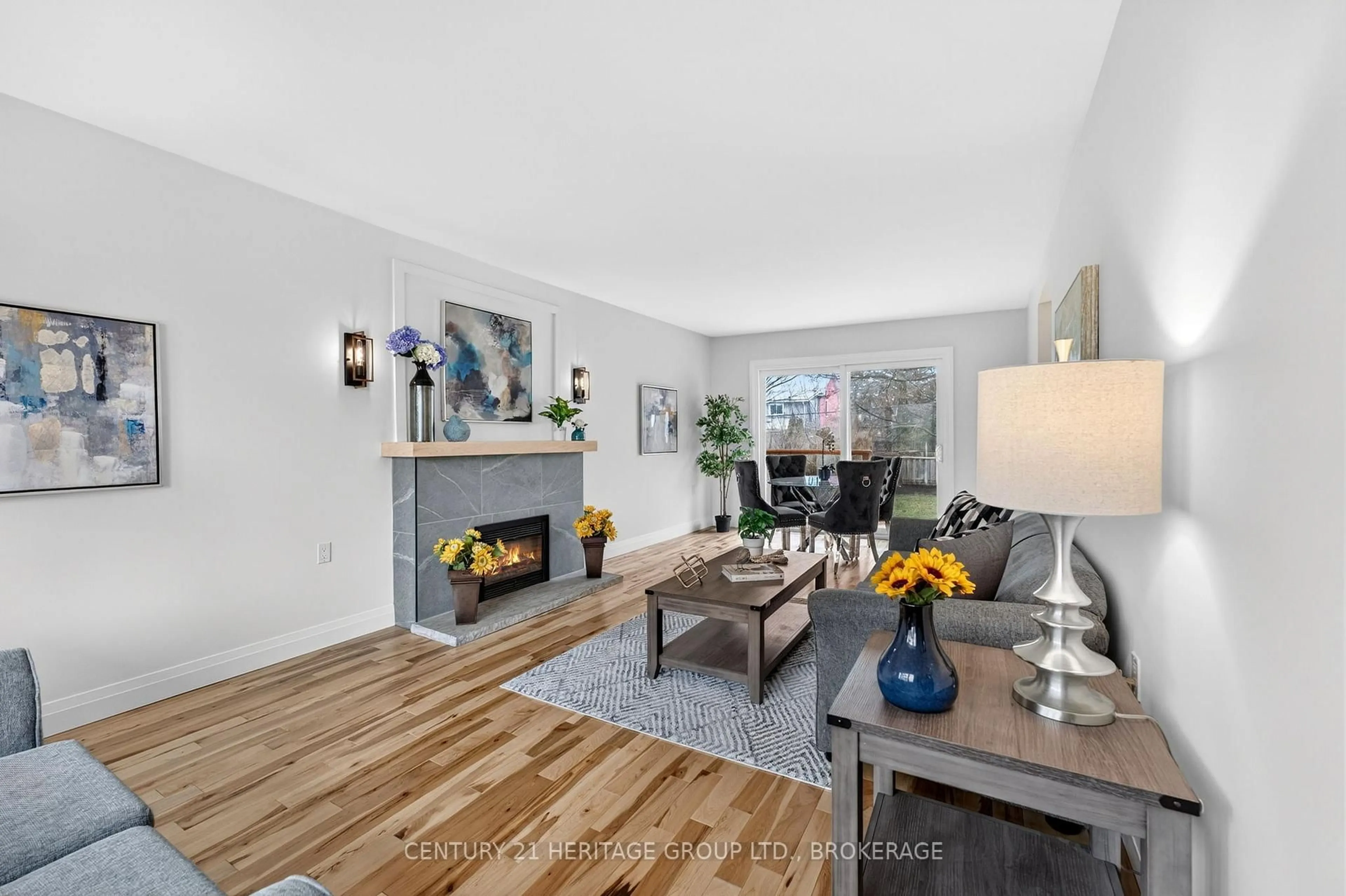 Living room with furniture, wood/laminate floor for 439 College St, Kingston Ontario K7L 4M8